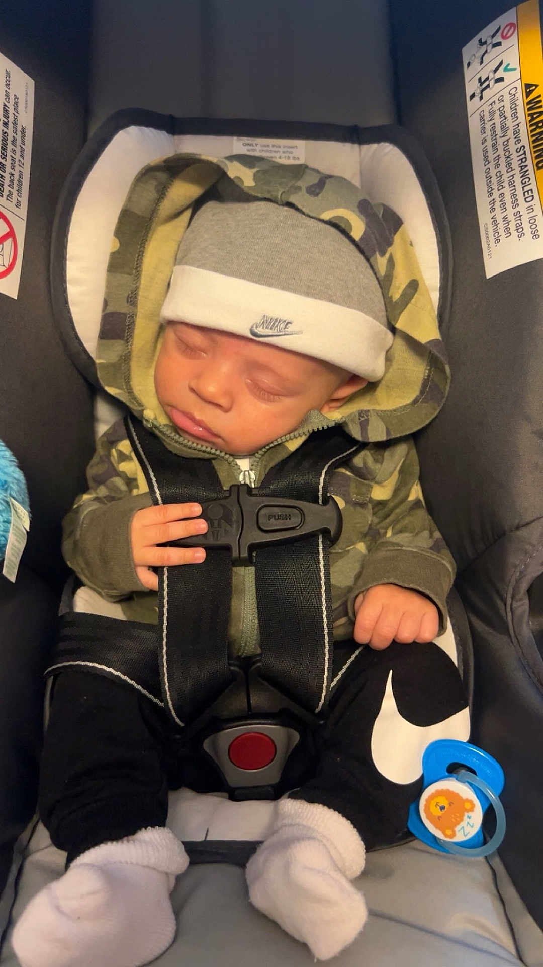 Legend joined the competition — help win amazing prizes! baby, sleeping, car_seat, hoodie, hat, nike, pacifier, socks, clothing, child, infant, straps, safety, cute, peaceful, resting, indoor, seat, black, camouflage