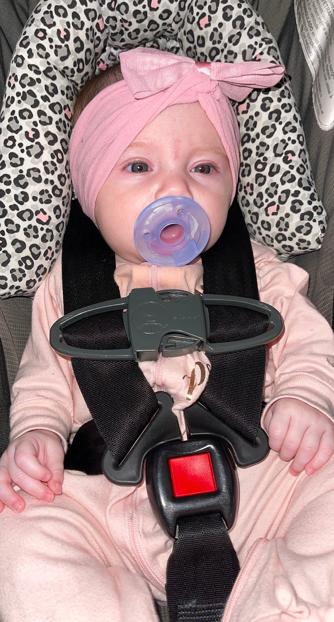 Addisyn joined the competition — help win amazing prizes! baby, baby_carriage, baby_products, baby_toddler_clothing, car_seat, cheek, child, comfort, eye, fashion_accessory, finger, head, headwear, person, personal_protective_equipment, pink, seat_belt, sitting, skin, thumb