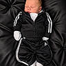 Messiah joined the competition — help win amazing prizes! baby, sleeping, tracksuit, adidas, black_clothing, white_stripes, infant, cute, fashion, sporty, leather, tufted_surface, child, portrait, resting, newborn, clothing, footwear, white_socks, relaxed
