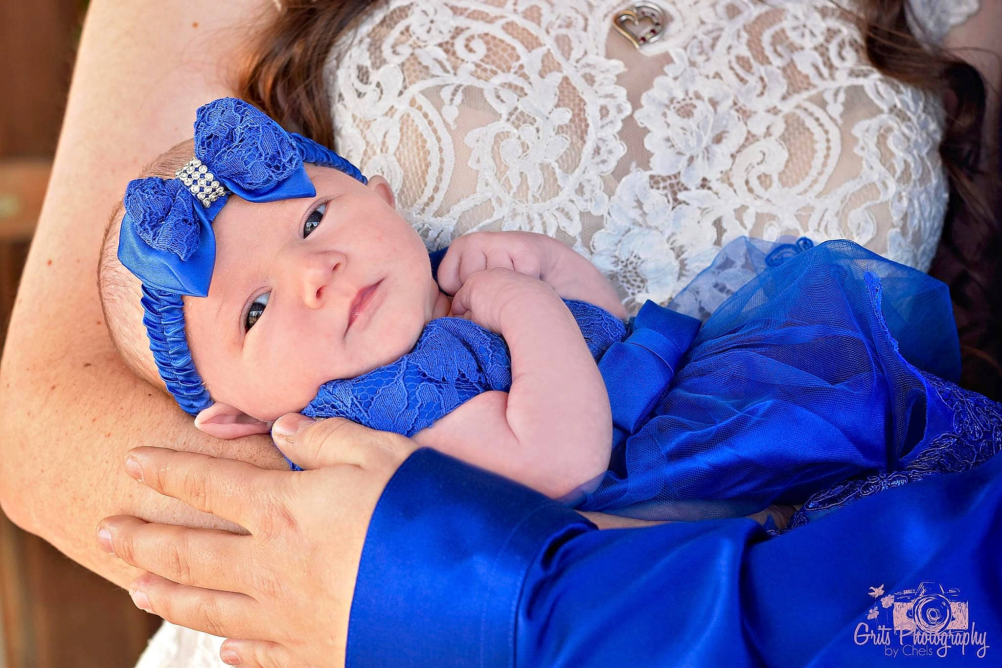 Addilyn is registered to the contest to win money with this photo: baby, baby_products, baby_toddler_clothing, blue, cheek, child, comfort, electric_blue, eye, fashion_accessory, hand, happy, headband, headgear, headwear, nail, pattern, person, purple, skin