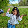 Elianah participe au concours pour gagner de l'argent avec cette photo : casual_clothing, child, cute, daytime, flower, girl, grass, happy, jeans, nature, outdoor, park, playful, posing, shoes, smiling, spring, trees, white_top, young
