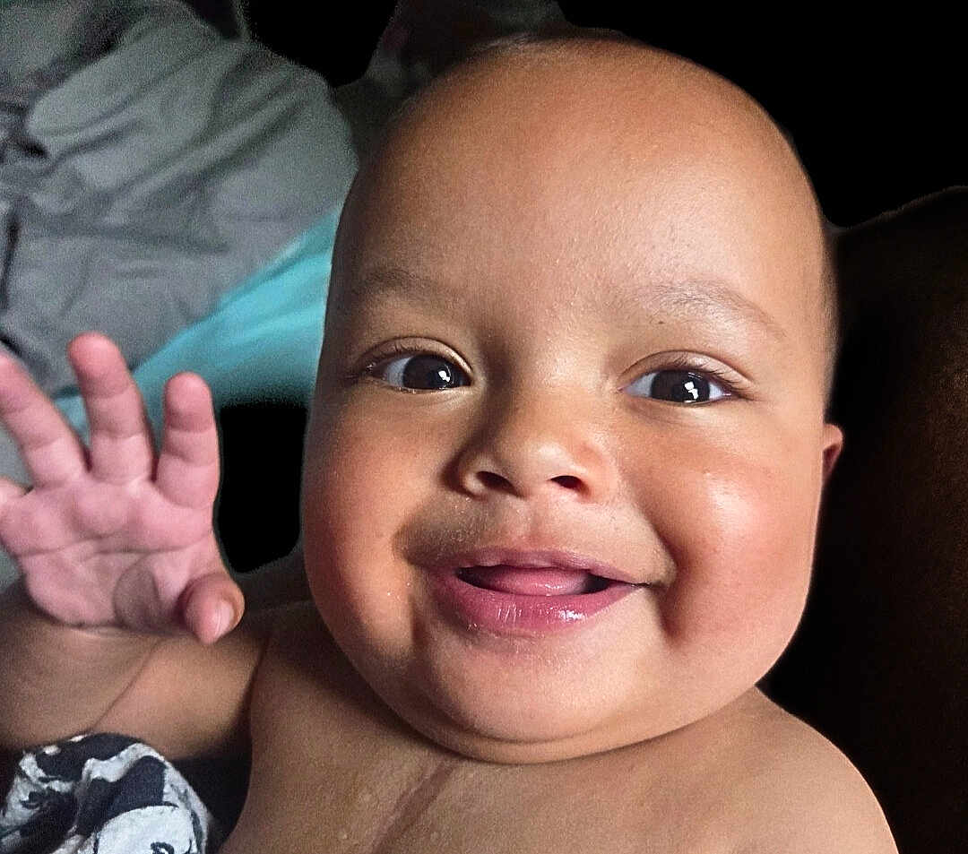 Enoch joined the competition — help win amazing prizes! baby, smiling, face, hand, child, cute, portrait, skin, happy, expression, infant, cheerful, closeup, person, young, bareshoulders, innocence, brighteyes, joy, waving
