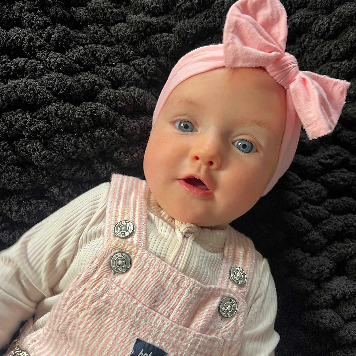 Harlynn Rae joined the competition — help win amazing prizes! accessories, baby, beanie, bonnet, cap, clothing, coat, dress, face, hat, head, headband, knitwear, newborn, pants, person, photography, portrait, sweater, toy