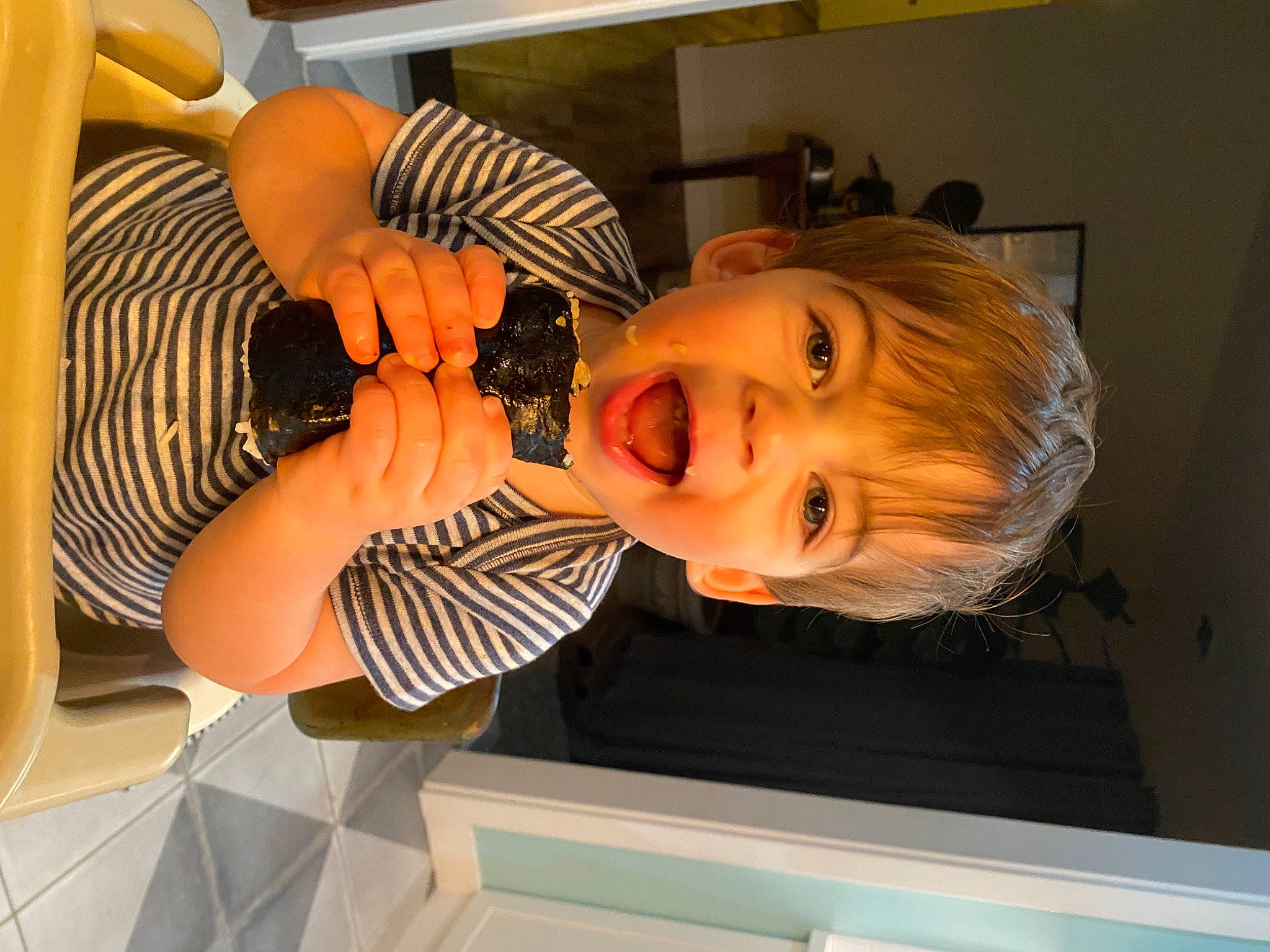 Felix joined the competition — help win amazing prizes! baby, baby_toddler_clothing, child, elbow, fun, gesture, happy, human_leg, person, room, shelf, smile, t_shirt, thumb, toddler, window, wood, wrist