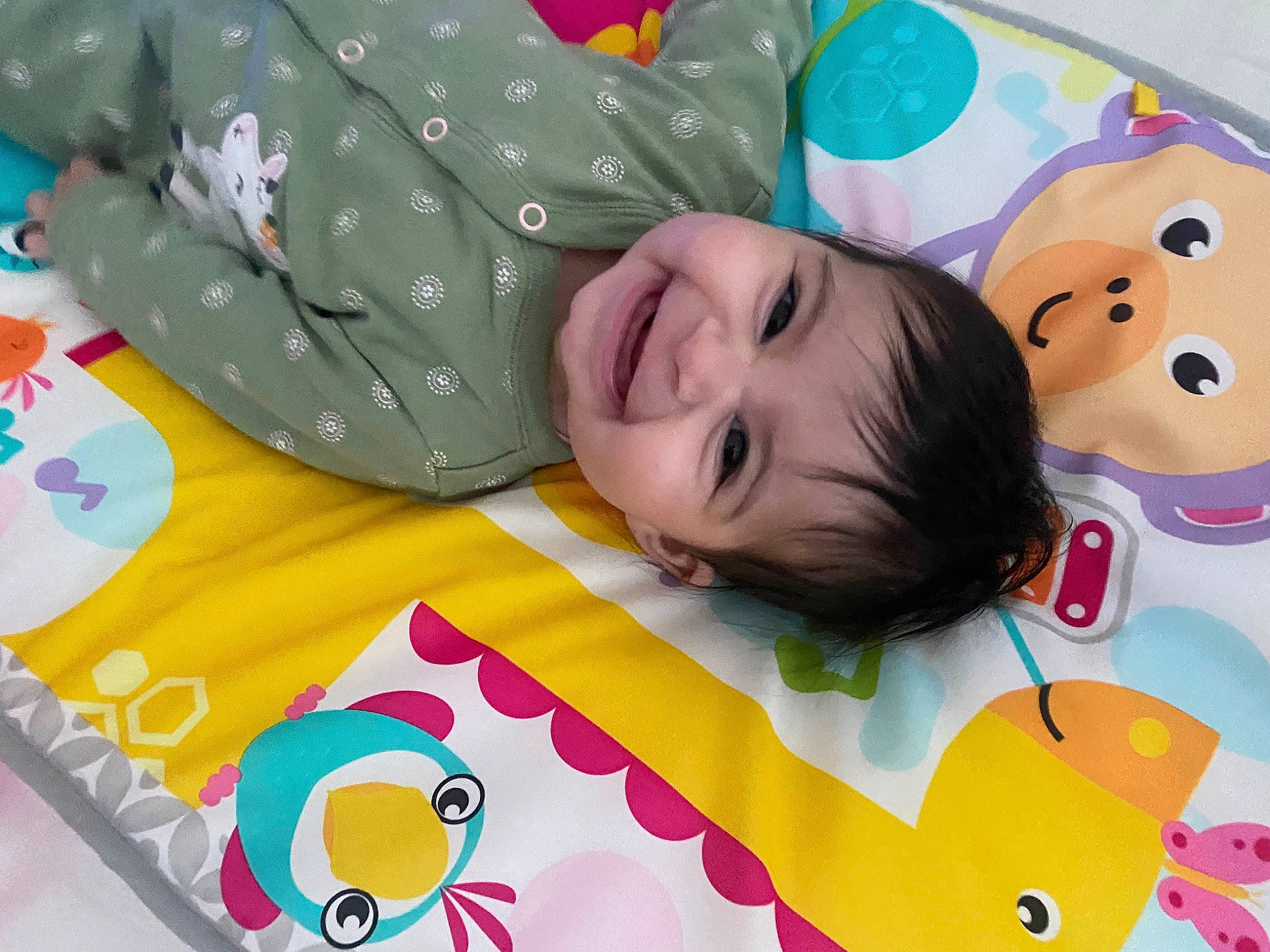 Arya is registered to the contest to win money with this photo: art, baby, baby_products, baby_toddler_clothing, baby_toys, bedding, cheek, child, comfort, fun, happy, joy, leisure, linens, pattern, person, play, room, smile, textile