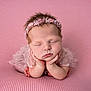 Ainsley Kay joined the competition — help win amazing prizes! baby, newborn, sleeping, pink, headband, flower, lace, infant, cute, peaceful, portrait, soft, hands, feet, closeup, child, resting, blanket, studio, adorable