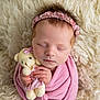 Ainsley Kay joined the competition — help win amazing prizes! newborn, baby, sleeping, teddy_bear, pink_blanket, headband, soft_texture, cute, portrait, infant, wrapped, peaceful, closeup, child, fluffy, adorable, resting, hands, toy, cozy