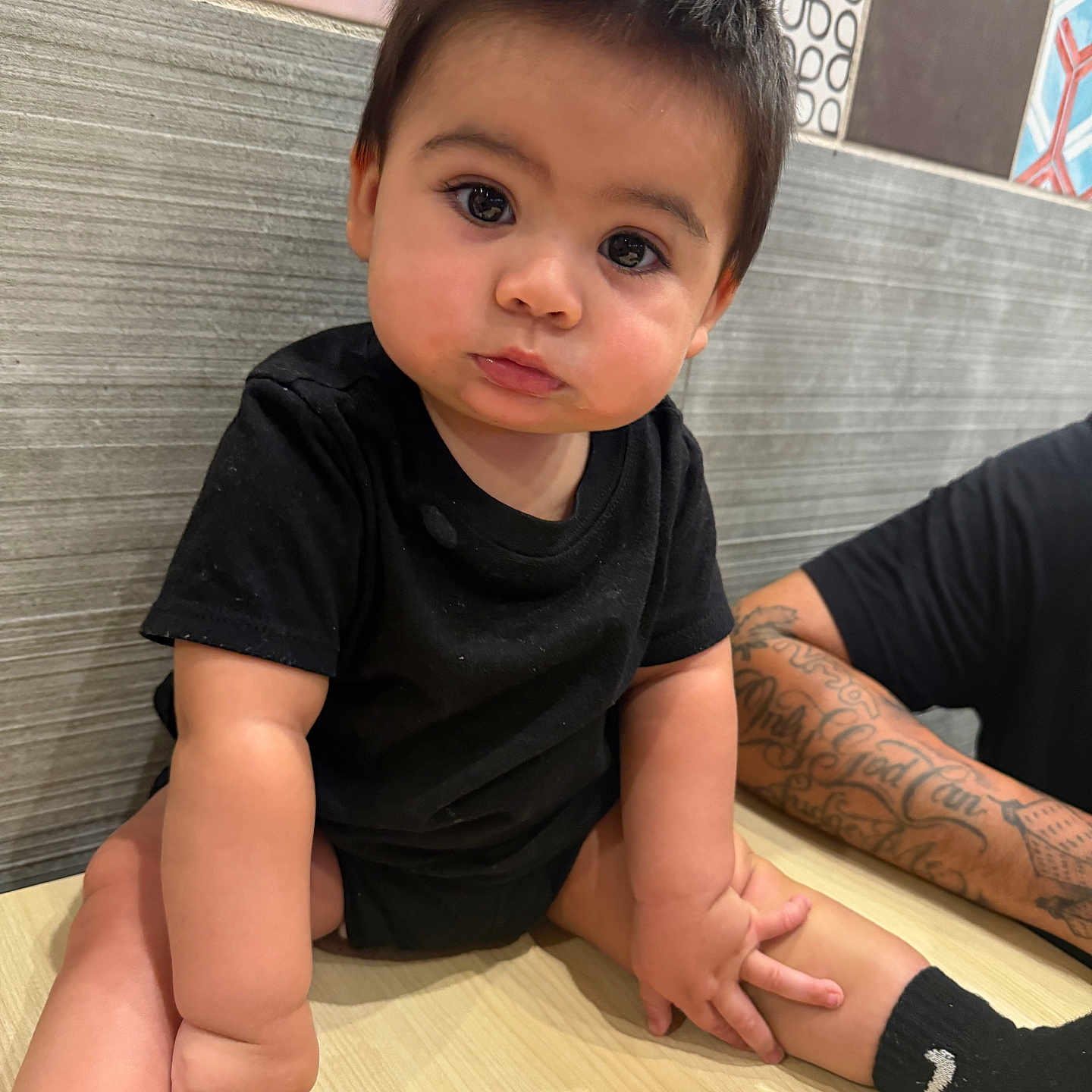 Andres joined the competition — help win amazing prizes! arm, baby, bodypart, clothing, face, finger, hand, head, hosiery, indoors, interiordesign, person, photography, portrait, sitting, skin, sock, tape, tattoo, wood