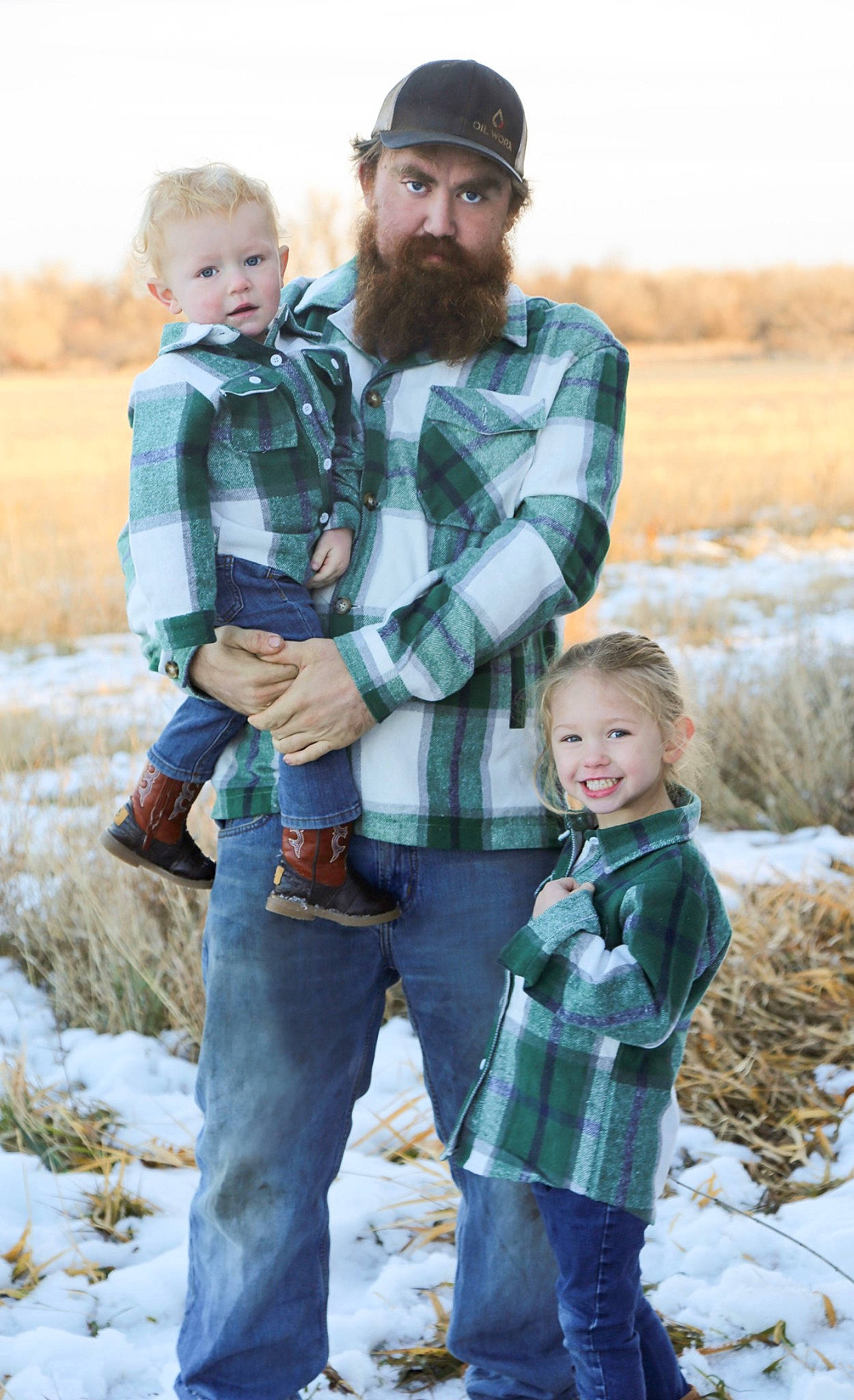 Charles is registered to the contest to win money with this photo: beard, child, clothing, eye, face, flash_photography, fun, gesture, grass, happy, head, headwear, jeans, joy, outerwear, people, people_in_nature, person, photograph, snow