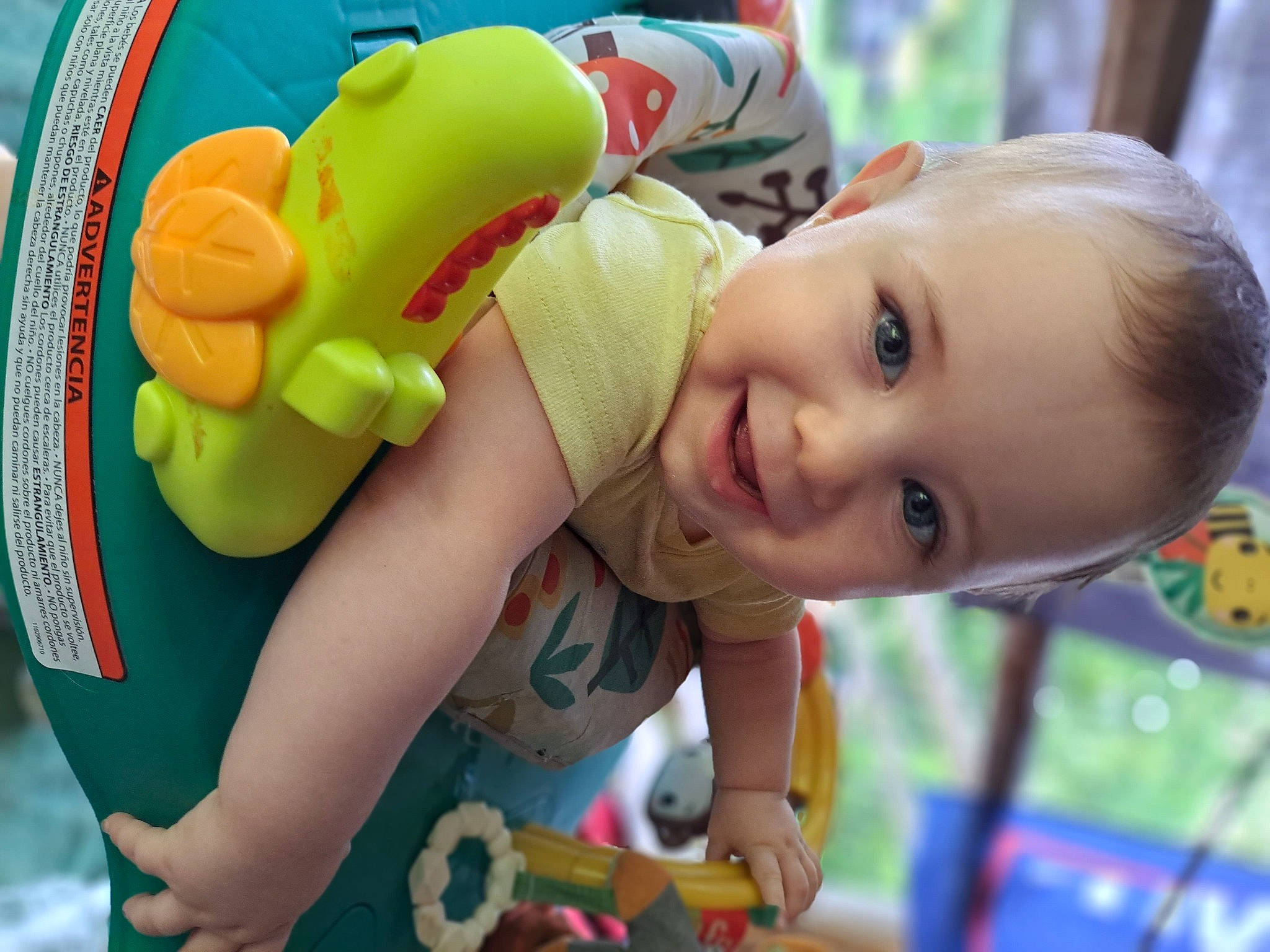 Cillian is registered to the contest to win money with this photo: baby, baby_playing_with_toys, baby_products, baby_safety, baby_toddler_clothing, cheek, child, fun, grass, happy, human_body, joy, leisure, person, personal_protective_equipment, play, product, recreation, skin, smile