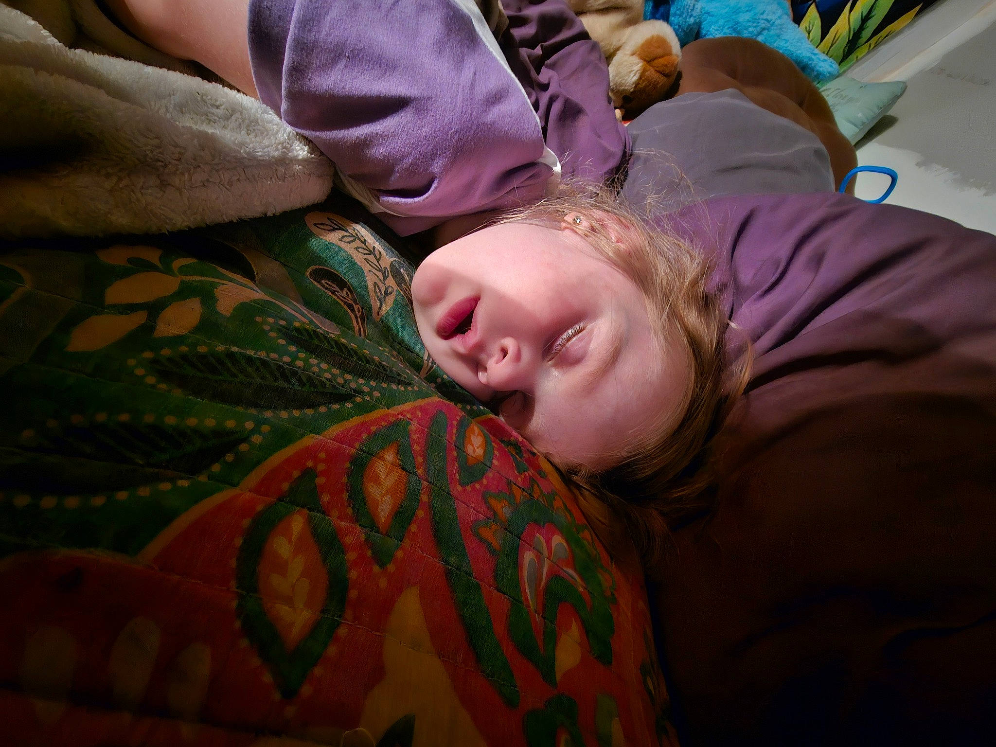 Lunafreya is registered to the contest to win money with this photo: bedding, child, comfort, flesh, flooring, fun, fur, grass, happy, linens, mouth, nap, organ, pattern, person, room, sitting, sleep, textile, tree