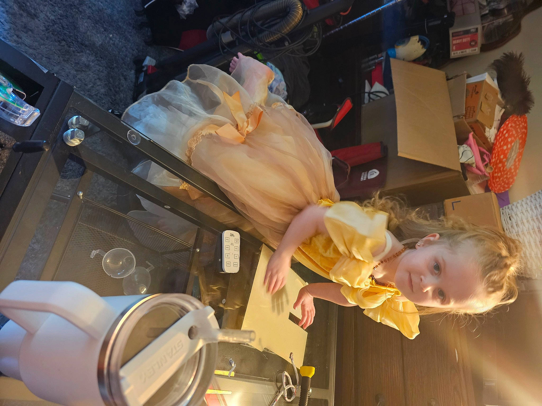 Lunafreya is registered to the contest to win money with this photo: auto_part, automotive_design, automotive_lighting, fun, hat, human_leg, machine, person, room, service, space, toddler