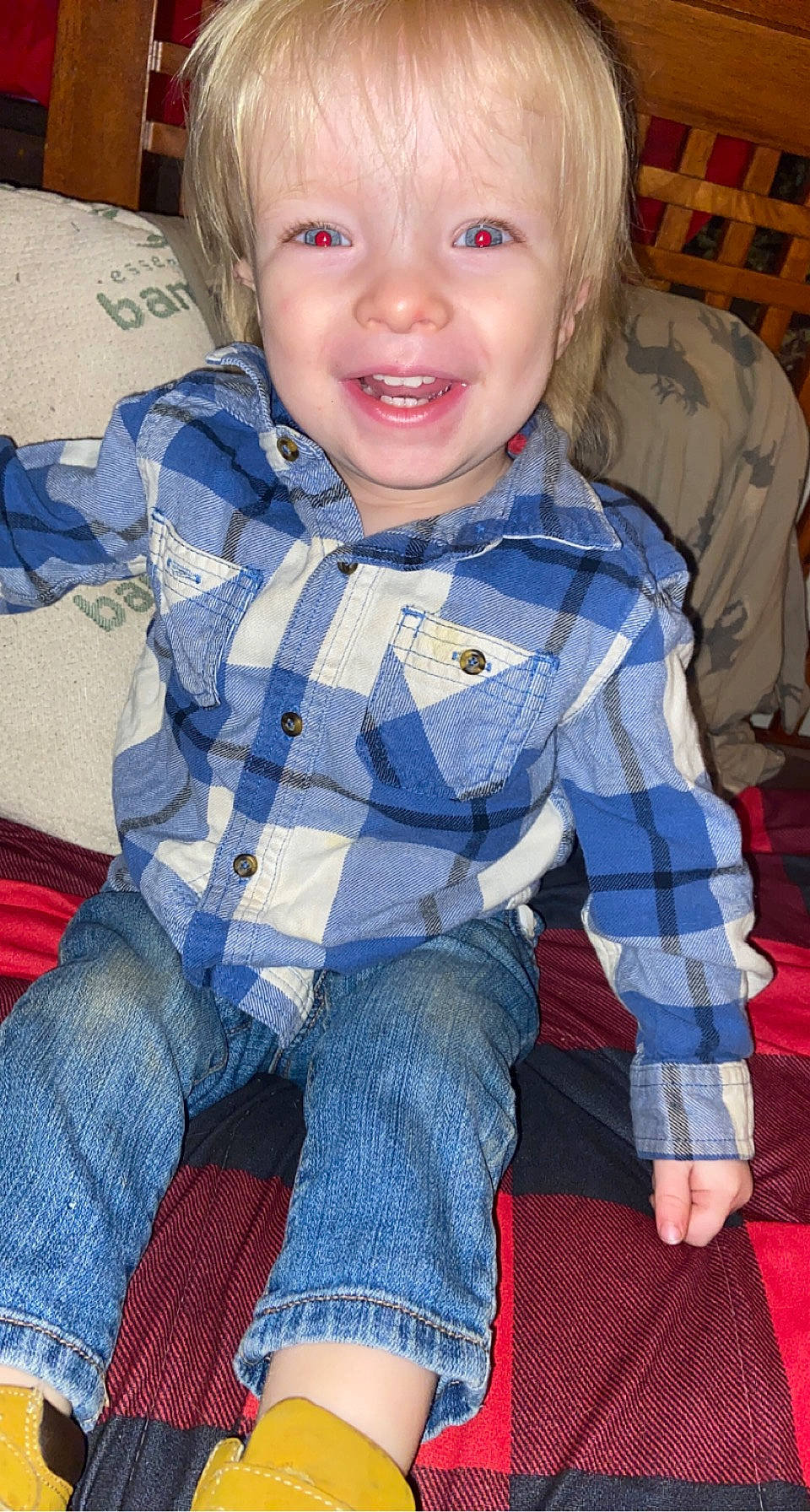 Joseph is registered to the contest to win money with this photo: baby_toddler_clothing, blue, cheek, clothing, eye, face, happy, head, iris, joy, leg, lip, nose, organ, person, plaid, skin, sleeve, smile, standing