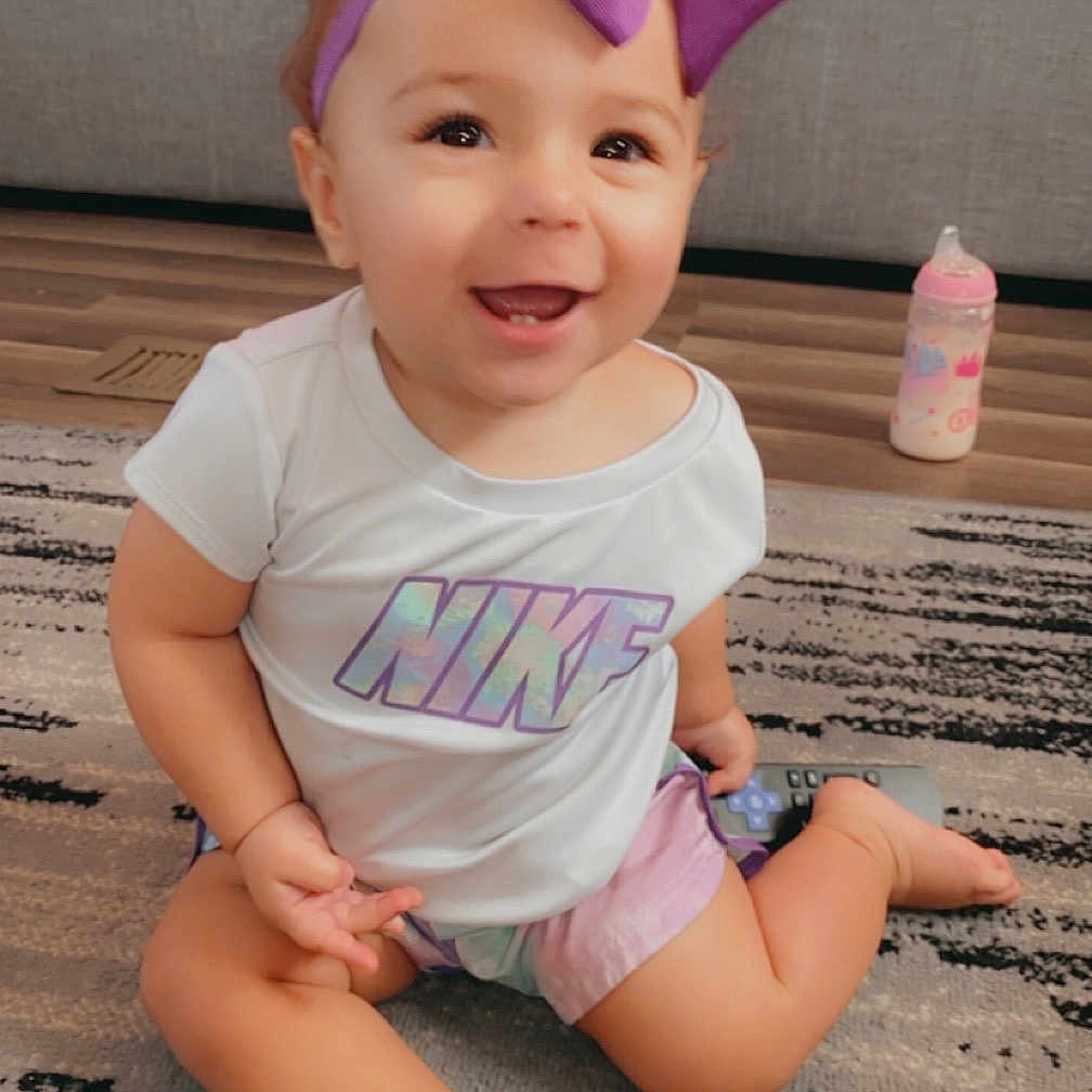 Tiana is registered to the contest to win money with this photo: accessories, applique, architecture, baby, babylaughing, balloon, barefoot, bathroom, bed, bedroom, beverage, blonde, bodypart, bonnet, bottle, bracelet, building, cake, cap, chair