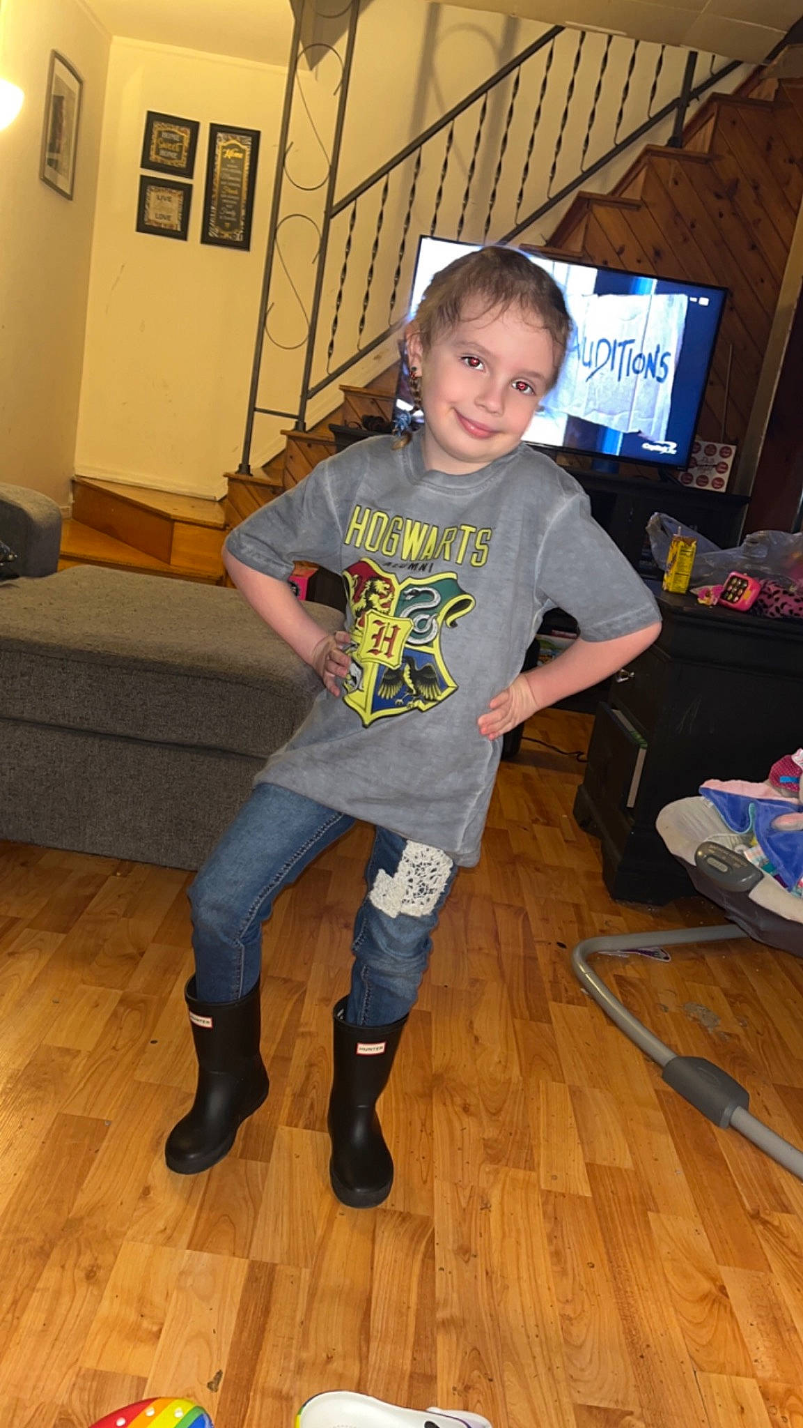 Kelani joined the competition — help win amazing prizes! door, event, floor, flooring, fun, happy, hardwood, joint, joy, leisure, person, shoe, sleeve, sneakers, t_shirt, television, thigh, toddler, trunk, waist