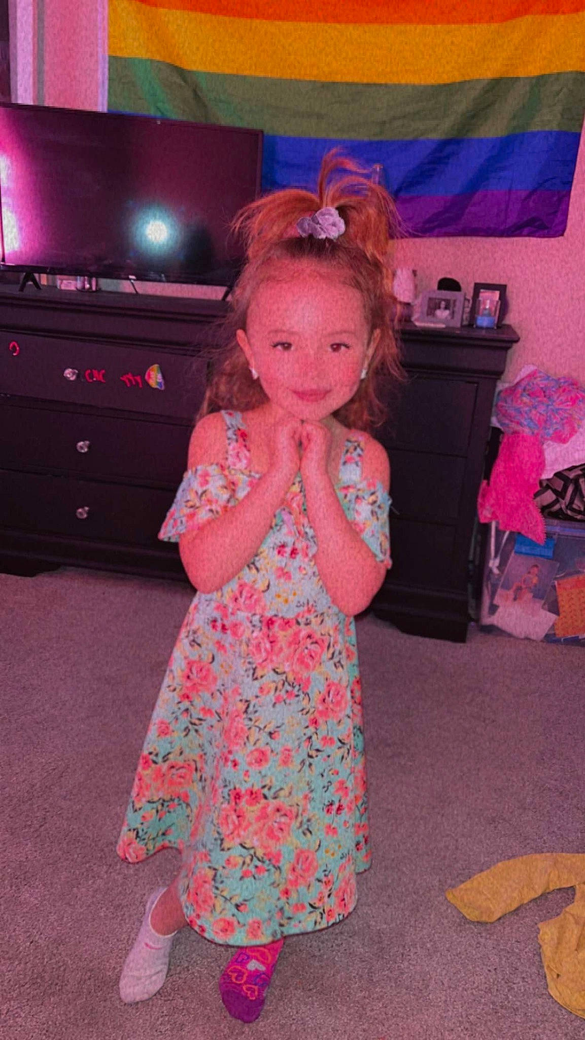 Kelani is registered to the contest to win money with this photo: beauty, chest_of_drawers, child, drawer, dress, entertainment, event, fashion_design, floor, flooring, fun, joy, magenta, pattern, person, pink, purple, room, standing, television