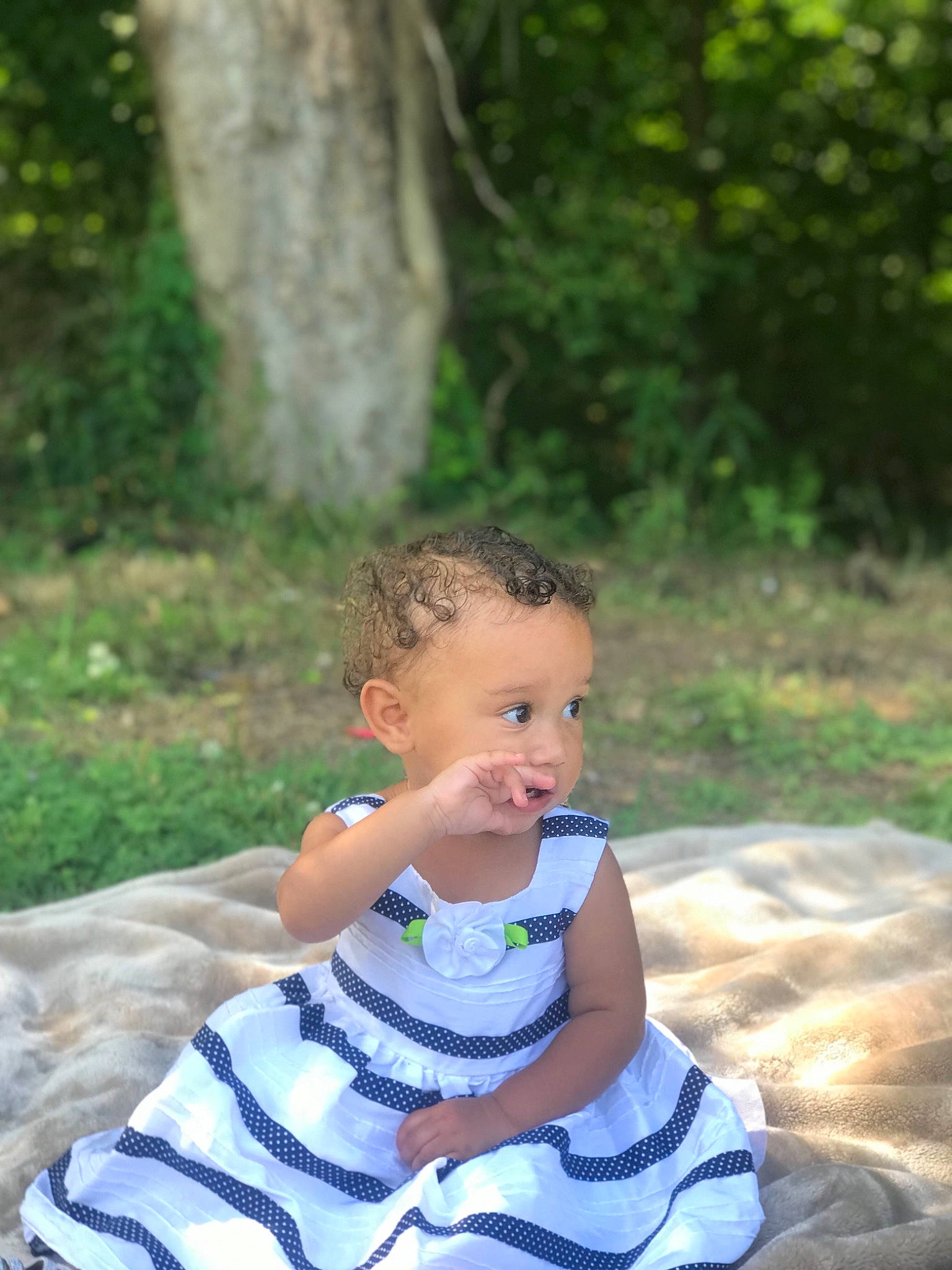 Chezney joined the competition — help win amazing prizes! baby, baby_toddler_clothing, beauty, botany, day_dress, dress, face, fun, grass, happy, head, leaf, leisure, pattern, people_in_nature, person, plant, recreation, sitting, toddler