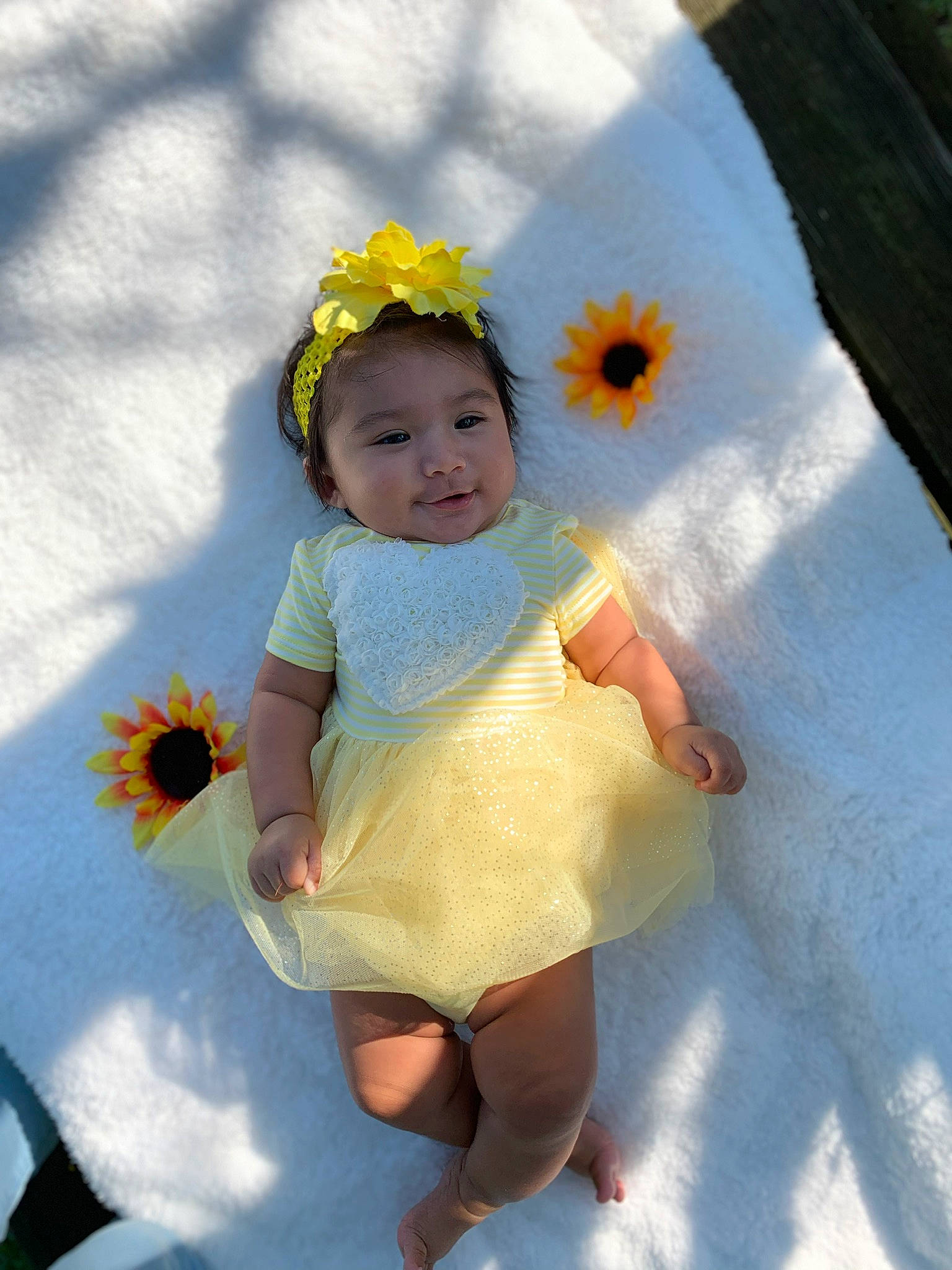 Ariadne joined the competition — help win amazing prizes! baby, baby_toddler_clothing, child, flower, hair_accessory, happy, person, plant, smile, toddler, yellow
