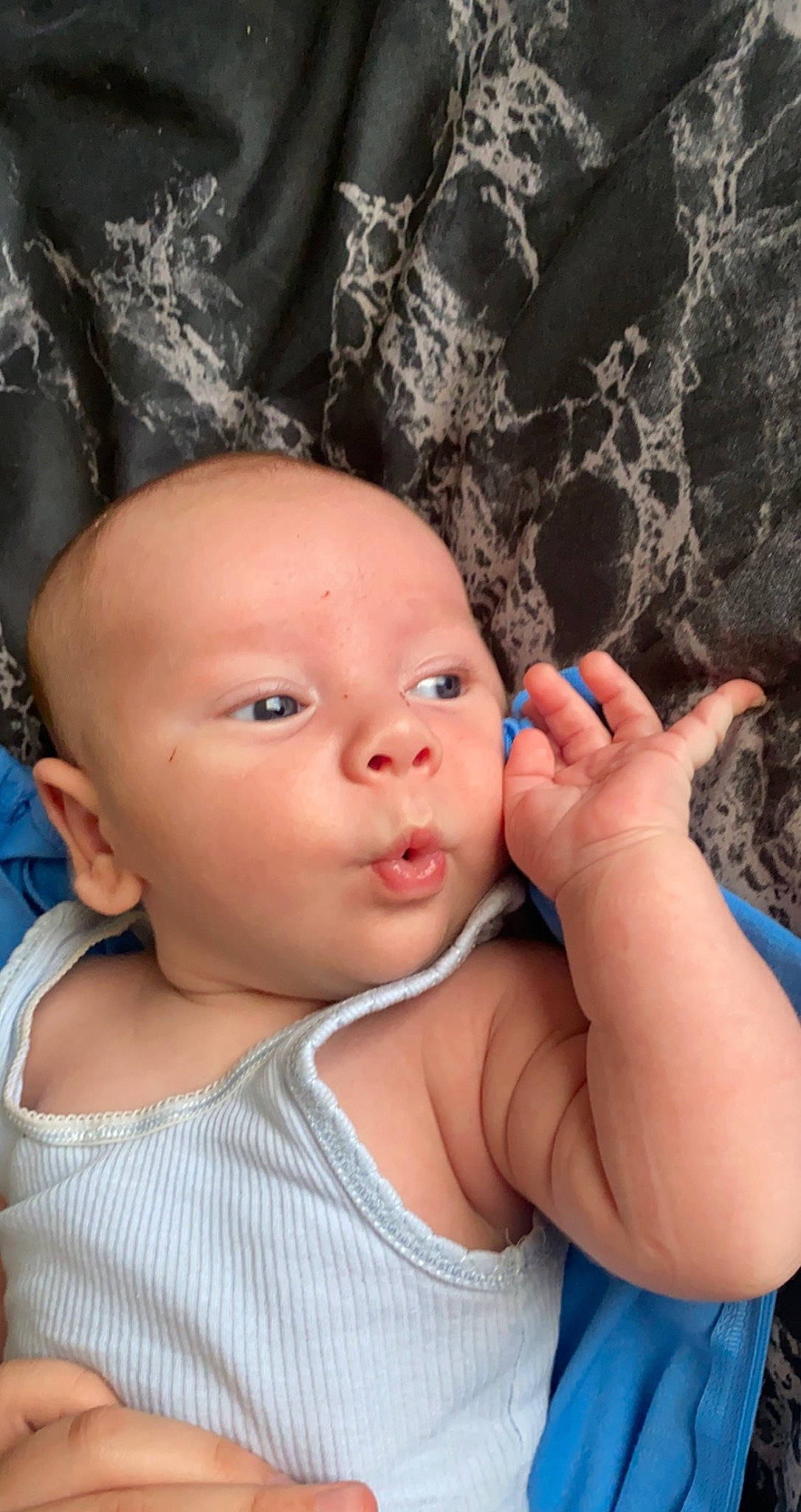 Arlo is registered to the contest to win money with this photo: baby, cheek, child, cool, electric_blue, eye, eyebrow, eyelash, fashion_accessory, fun, gesture, happy, human, lip, nail, nose, person, skin, thumb, toddler