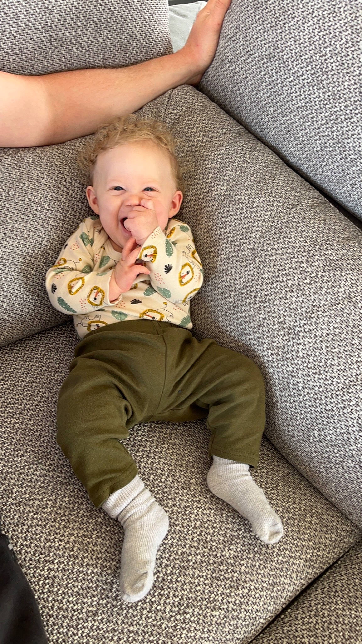 Ethan participe au concours pour gagner de l'argent avec cette photo : baby, baby_toddler_clothing, cheek, child, comfort, eye, facial_expression, finger, flooring, grass, happy, linens, mouth, person, sitting, skin, sleeve, smile, textile, toddler