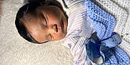 Ezereth is registered to the contest to win money with this photo: baby, sleeping, blanket, pacifier, onesie, infant, soft, cozy, cute, resting, face, head, child, knit, fabric, comfort, peaceful, newborn, indoor, portrait