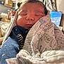 Ezereth joined the competition — help win amazing prizes! newborn, baby, sleeping, blanket, indoors, cozy, face, wrapped, soft, pattern, infant, child, human, peaceful, closeup, portrait, warm, cute, resting, nursery