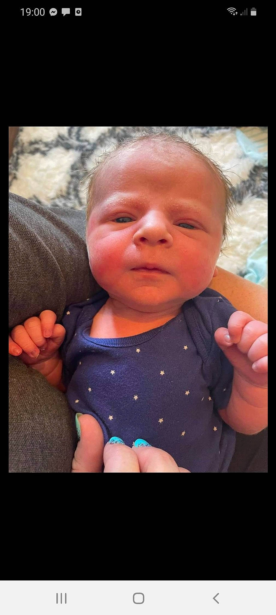 Chester is registered to the contest to win money with this photo: arm, baby, baby_toddler_clothing, cheek, chin, eyelash, finger, flash_photography, gesture, hand, happy, human, iris, lip, mouth, nose, person, photograph, skin, sleeve