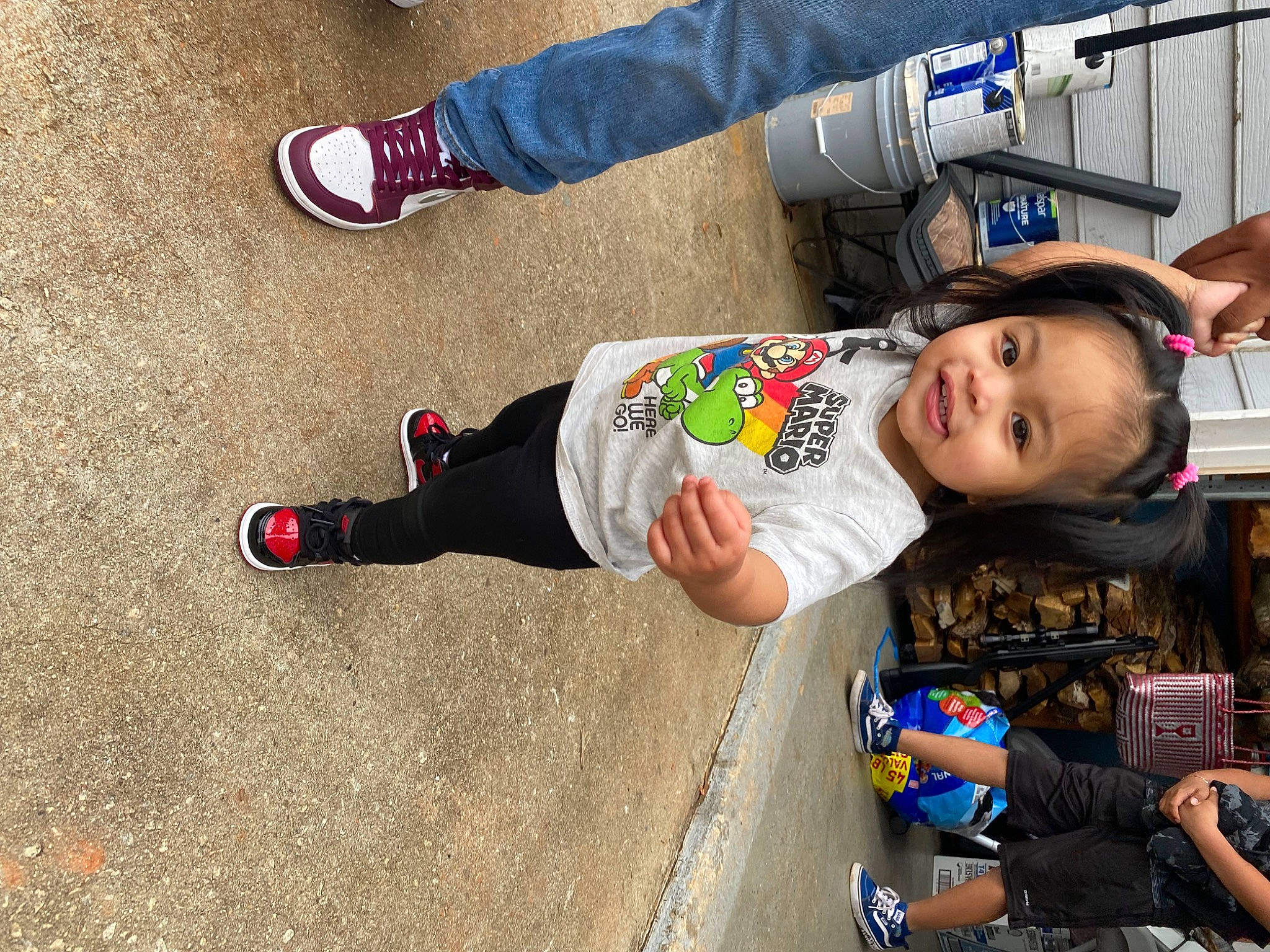 Laili is registered to the contest to win money with this photo: carmine, child, clothing, foot, footwear, fun, happy, human_leg, joy, leisure, person, recreation, shoe, shorts, snapshot, sneakers, sock, t_shirt, toddler, travel