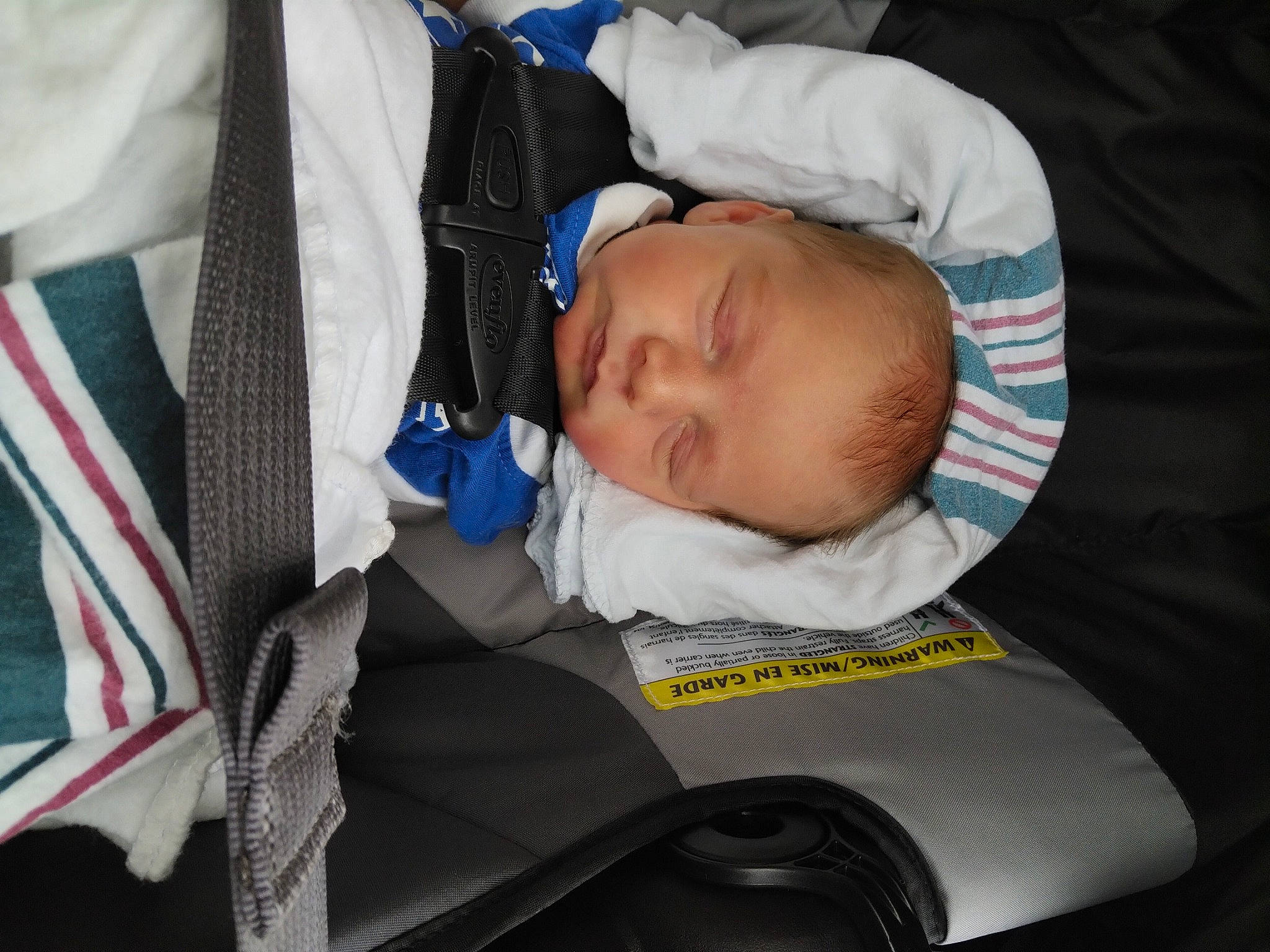 Waylon is registered to the contest to win money with this photo: baby, baby_carriage, baby_in_car_seat, baby_products, baby_safety, baby_toddler_clothing, car_seat, carmine, child, comfort, electric_blue, nap, person, product, sitting, toddler