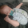 baby, sleeping, pacifier, blanket, beads, clothing, infant, hand, face, comfort, rest, soft, cute, child, indoors, nap, peaceful, cozy, fabric, bedtime