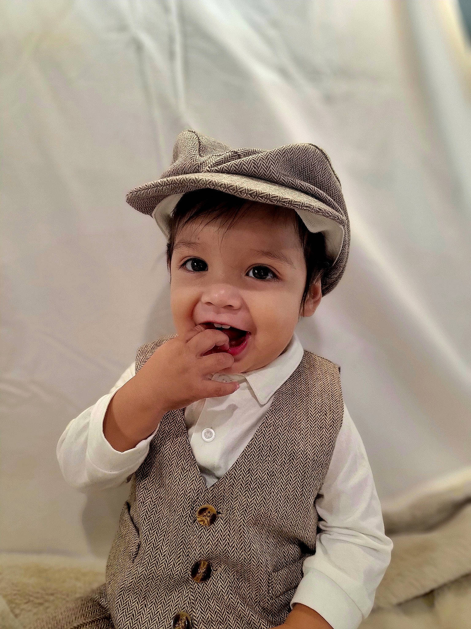 Vicente joined the competition — help win amazing prizes! baby, baby_toddler_clothing, cheek, chin, dress_shirt, eyelash, gesture, hairstyle, happy, hat, head, headgear, headwear, lip, pattern, person, product, skin, sleeve, smile