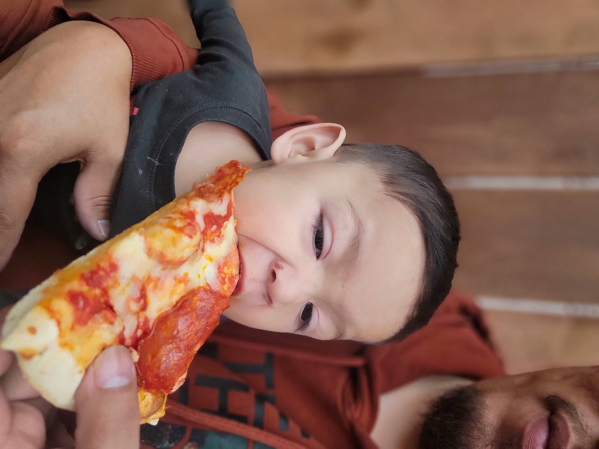 Vicente is registered to the contest to win money with this photo: child, comfort_food, cuisine, flash_photography, food, food_craving, fruit, hand, happy, ingredient, lip, meat, mouth, muscle, neck, orange, person, pizza, recipe, smile