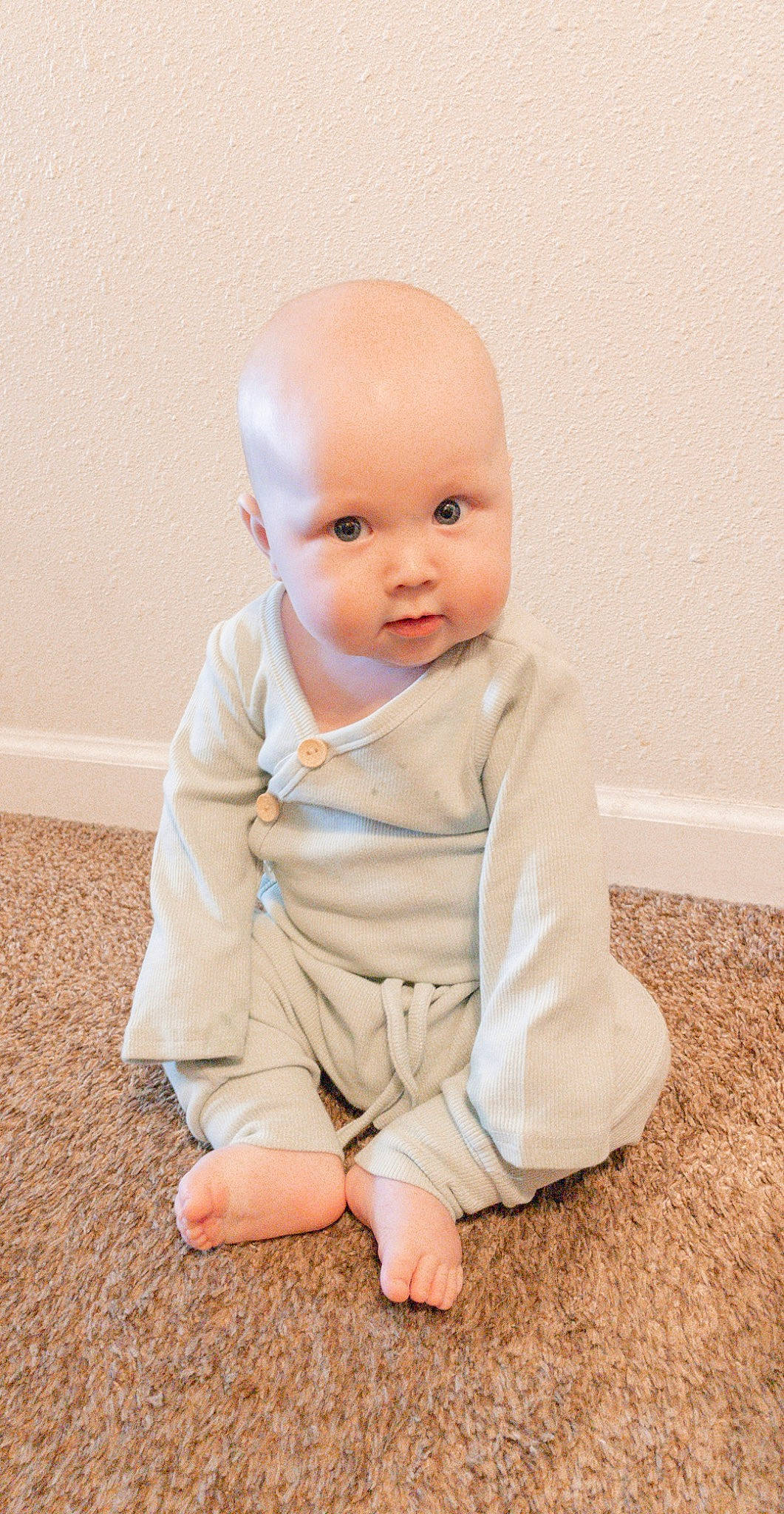 Gideon is registered to the contest to win money with this photo: baby, baby_toddler_clothing, cheek, collar, comfort, eye, eyebrow, face, flooring, hairstyle, happy, head, headgear, lip, mouth, nose, person, sleeve, smile, toddler