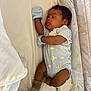 Owen is registered to the contest to win money with this photo: baby, sleeping, crib, onesie, mittens, socks, blanket, mesh, infant, child, cute, cozy, rest, peaceful, soft, bed, young, person, nursery, comfort