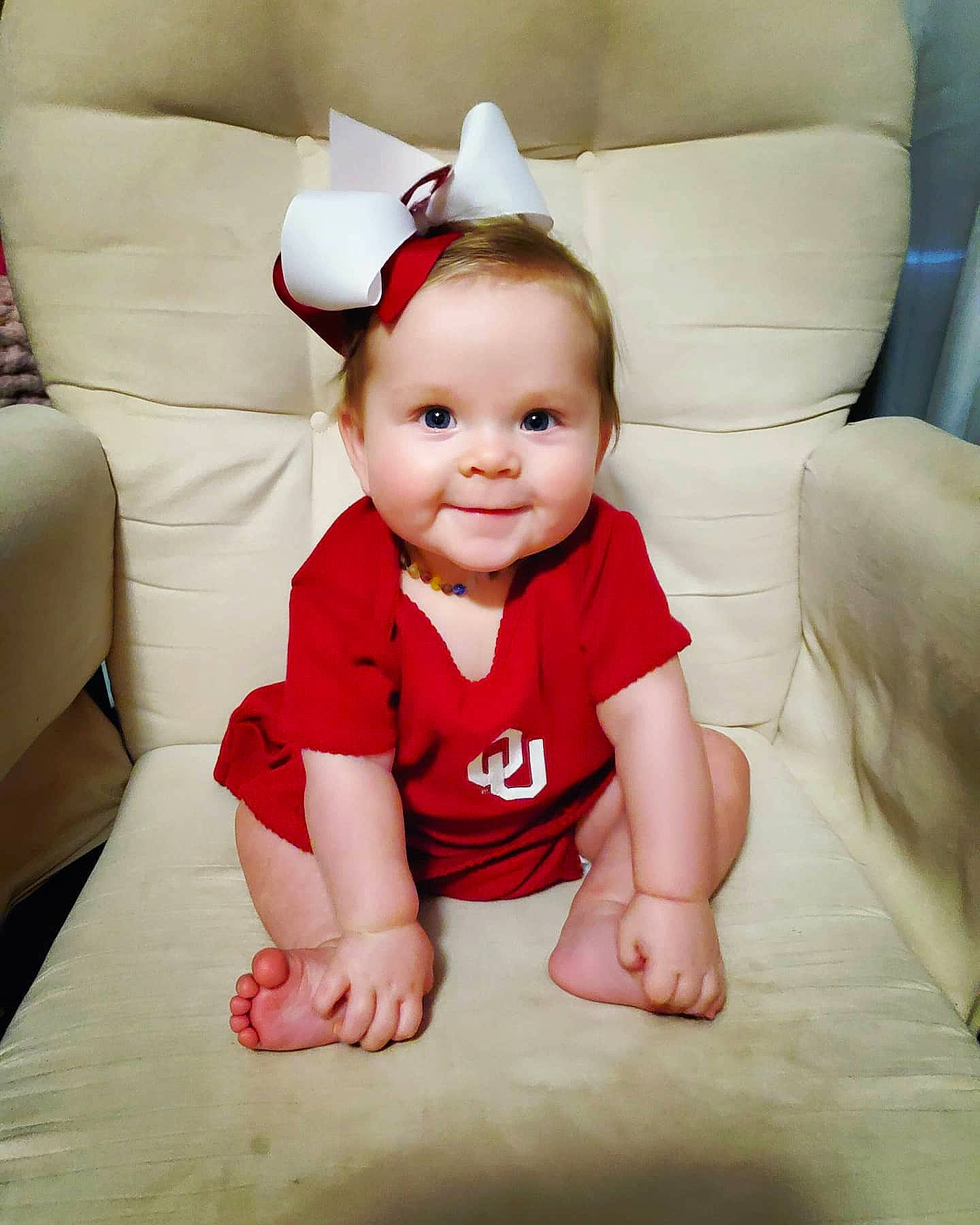 Kezley joined the competition — help win amazing prizes! baby, baby_products, baby_toddler_clothing, child, hair_accessory, head, headgear, joy, leg, person, product, sitting, skin, toddler