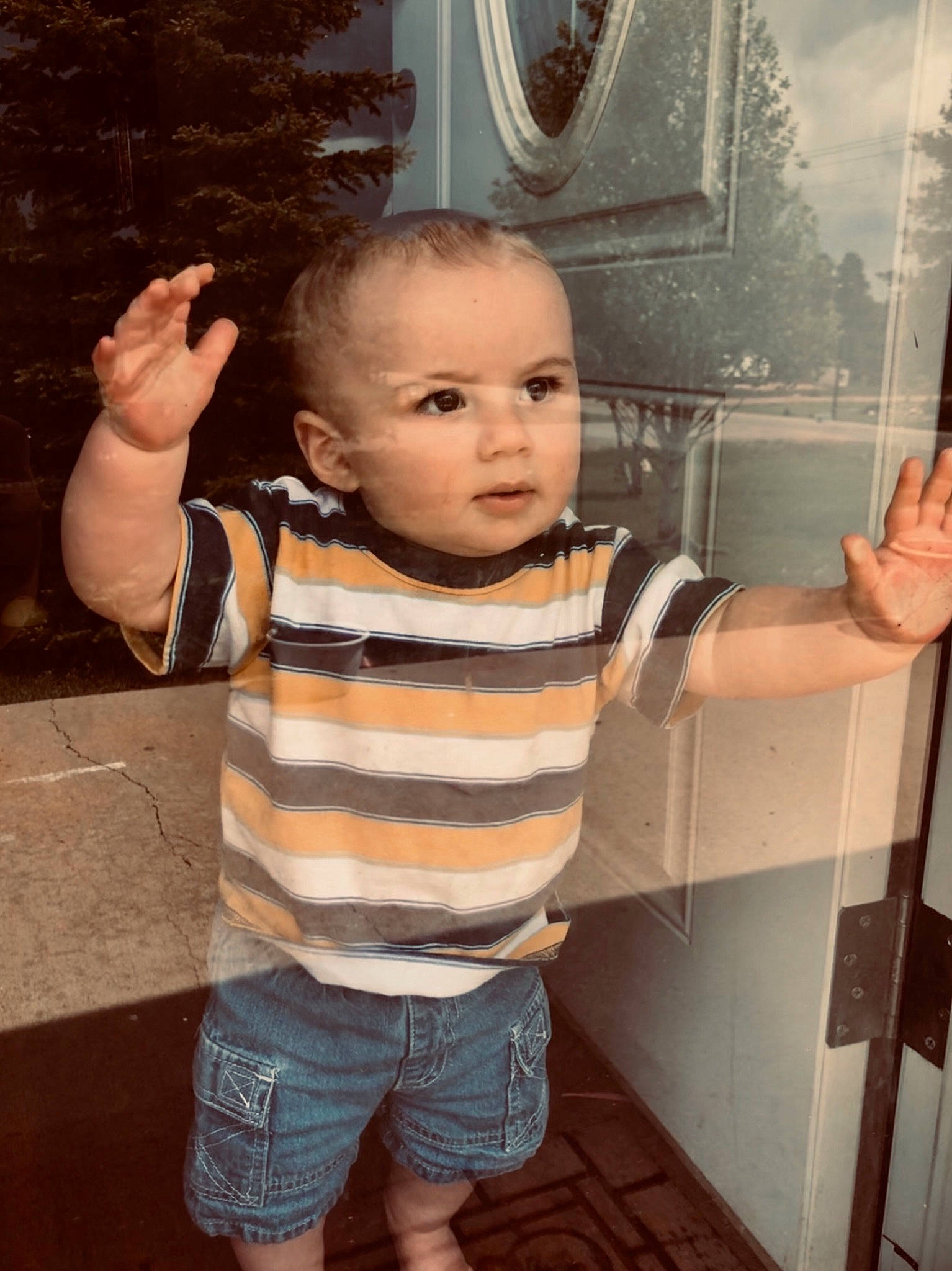 Kole joined the competition — help win amazing prizes! arm, cheek, child, cool, face, finger, fun, gesture, hair, hand, head, person, standing, thumb, toddler