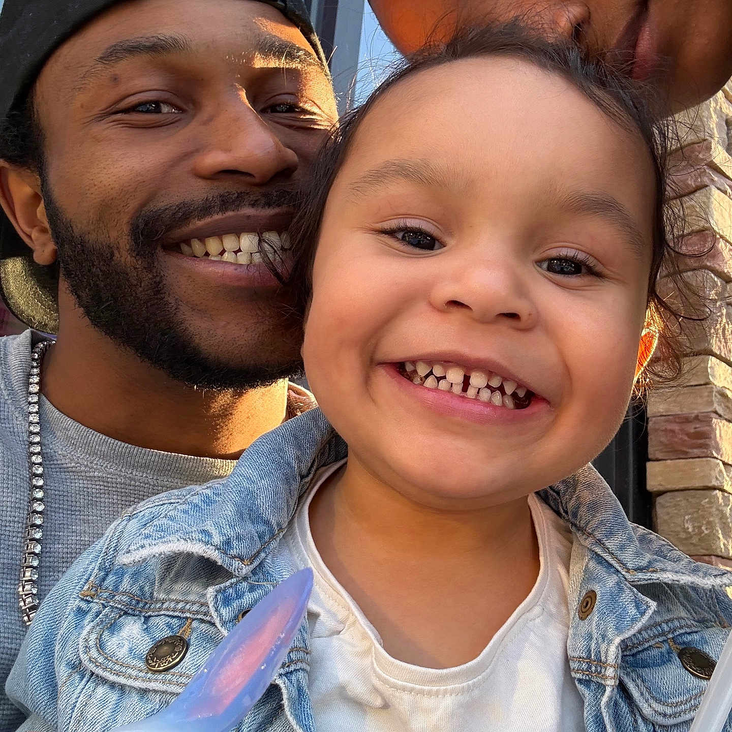 Amiya joined the competition — help win amazing prizes! beard, cap, casual_clothing, child, closeup, cup, denim_jacket, face, family, happy, joy, outdoor, people, portrait, skin, smiling, spoon, sunlight, togetherness, window