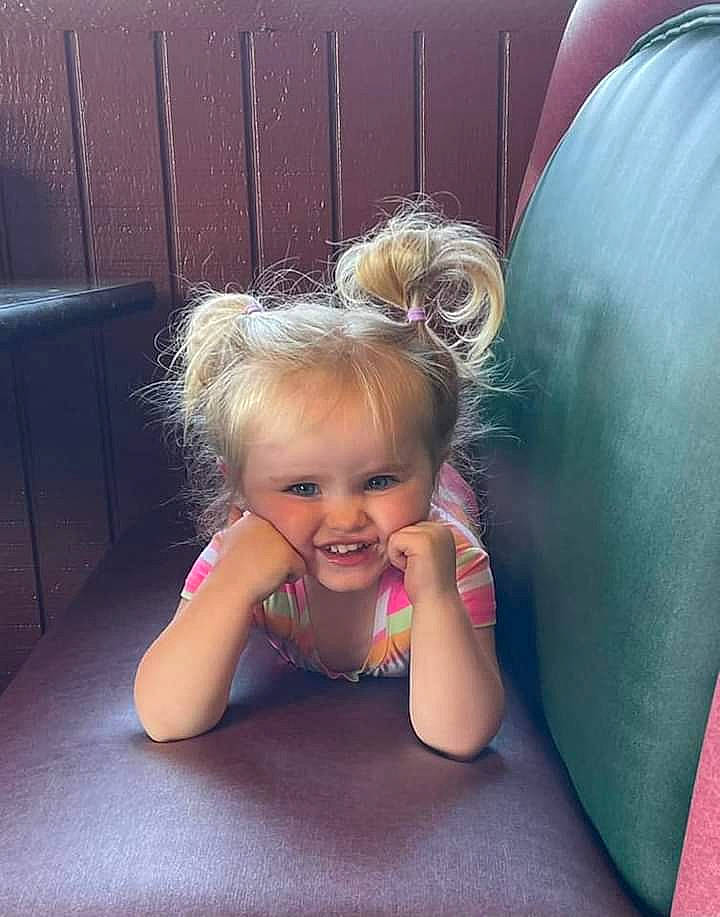 Ava is registered to the contest to win money with this photo: baby_toddler_clothing, child, crawling, eye, facial_expression, flash_photography, fun, grass, hair, happy, head, joy, leisure, mammal, organ, person, pink, purple, skin, smile