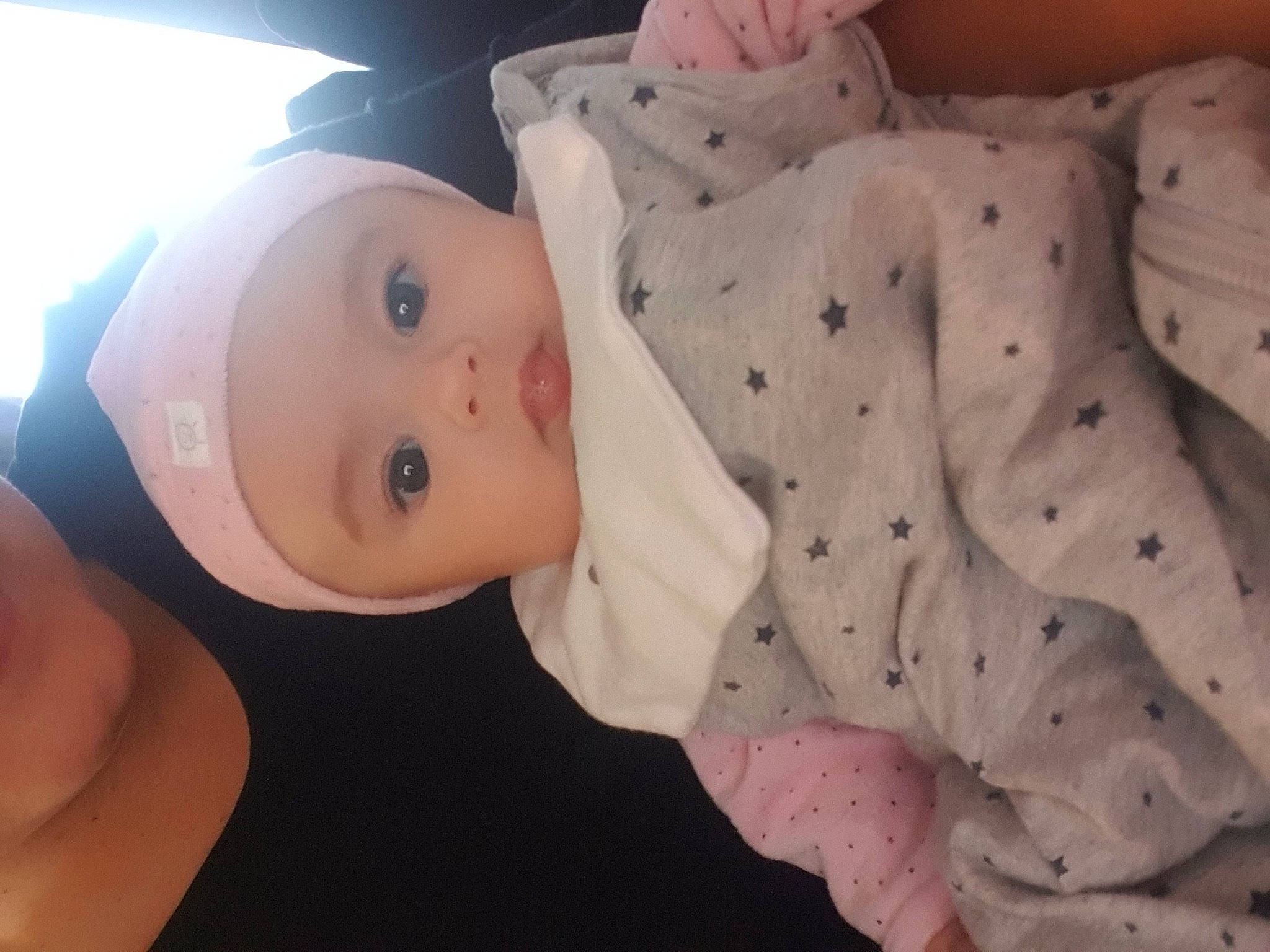 Abigaïl participe au concours pour gagner de l'argent avec cette photo : baby, baby_products, baby_toddler_clothing, cheek, child, chin, comfort, eyebrow, eyelash, gesture, hat, headwear, linens, lip, nose, person, pink, room, skin, sleeve