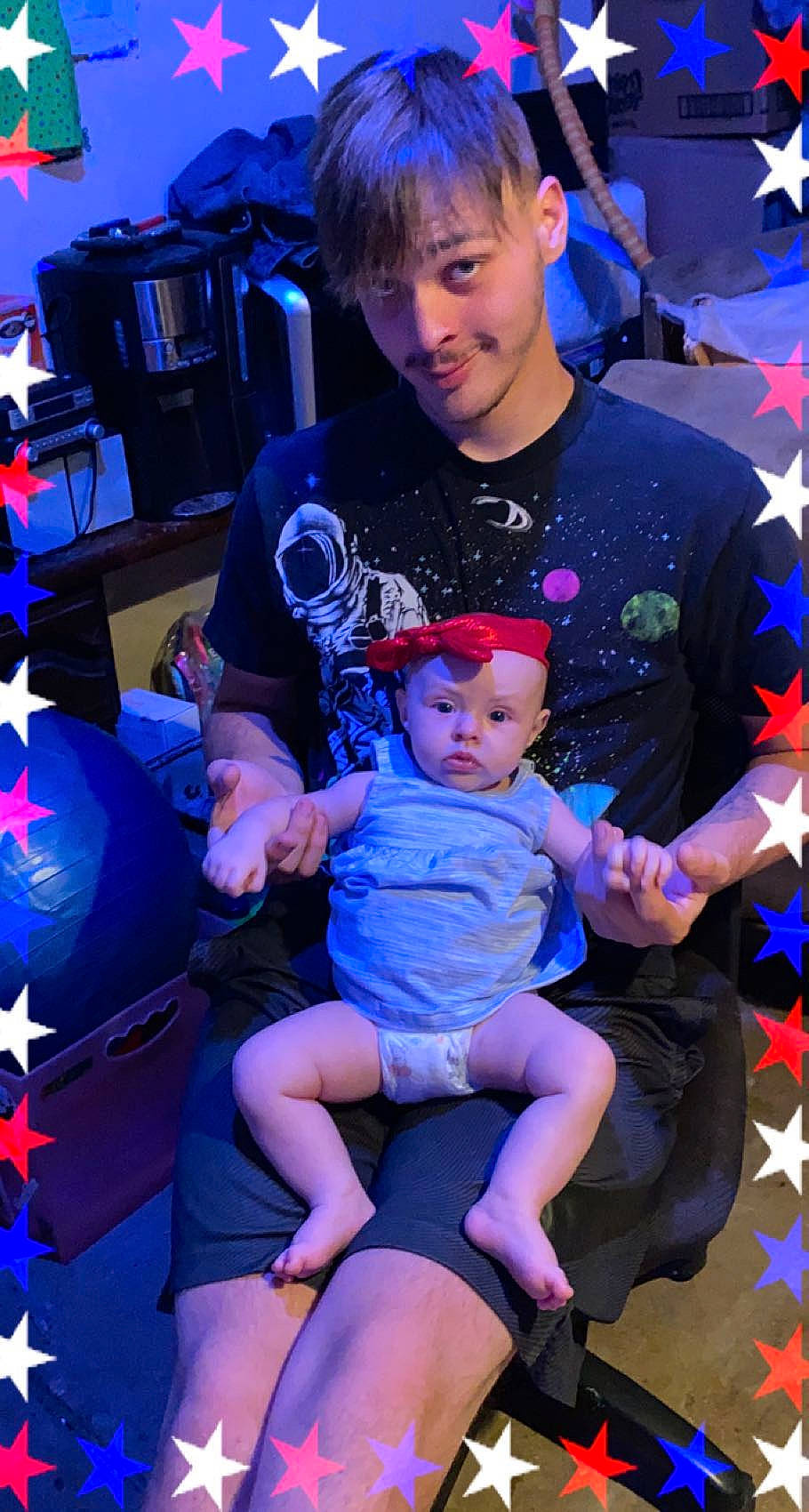 Amber is registered to the contest to win money with this photo: azure, baby_toddler_clothing, blue, chair, child, electric_blue, entertainment, event, fictional_character, fun, hairstyle, happy, joy, lap, leisure, magenta, person, pink, purple, t_shirt