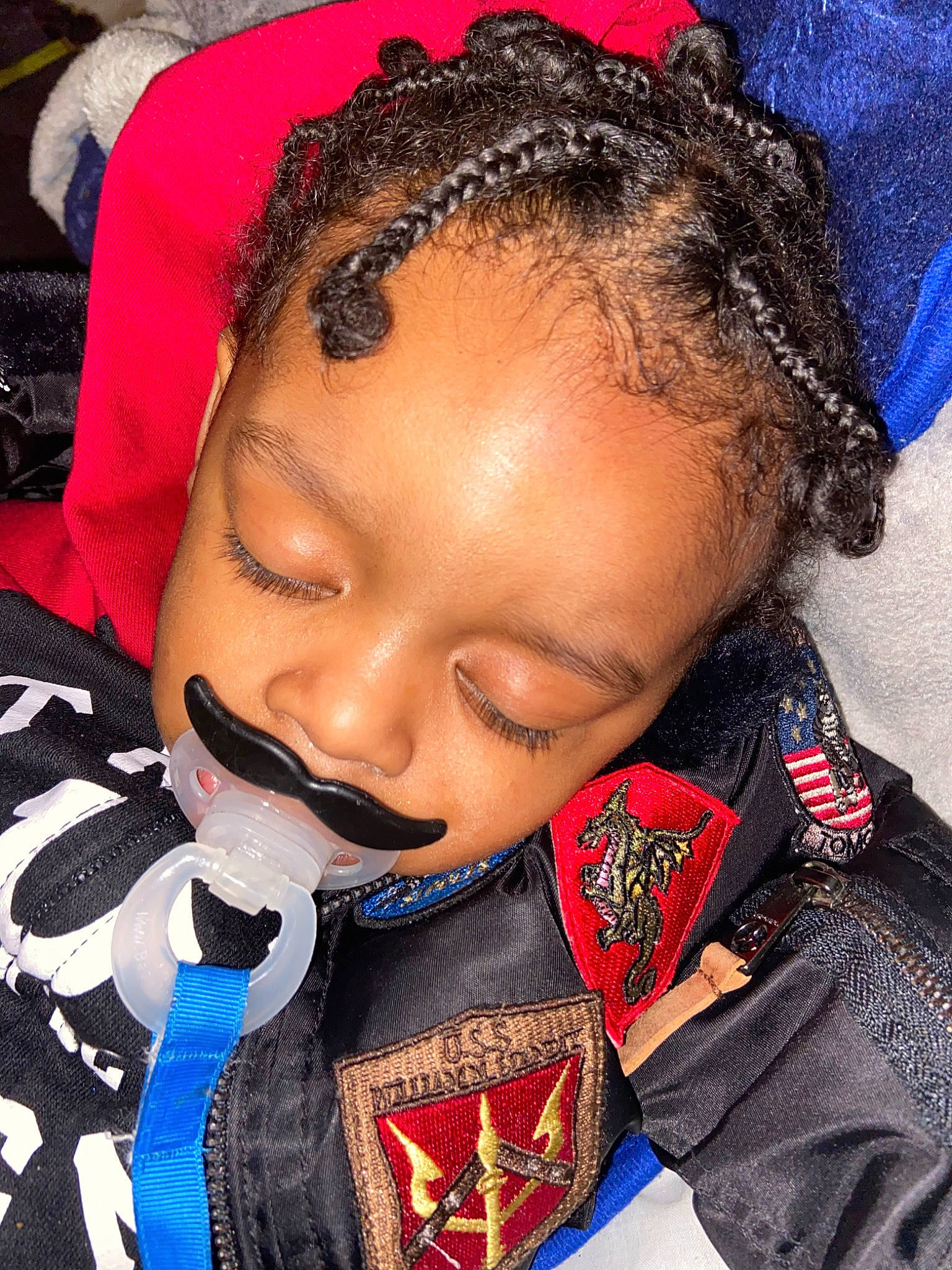 Maison is registered to the contest to win money with this photo: black_hair, braid, cheek, child, chin, cornrows, dreadlocks, eyebrow, face, forehead, hair, hairstyle, head, lip, mouth, neck, nose, person, toddler, tradition