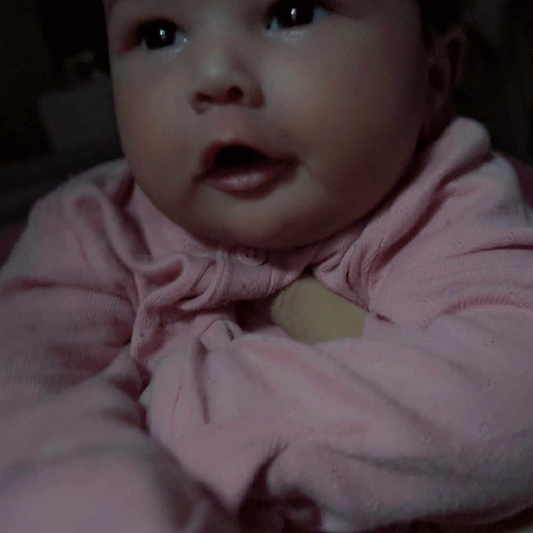 Khaleessi joined the competition — help win amazing prizes! adorable, baby, blanket, cheeks, child, close_up, cuteness, expression_surprised, eyes, face, hands, indoor, infant, low_light, mouth, pajamas, pink_clothing, portrait, skin, soft_lighting