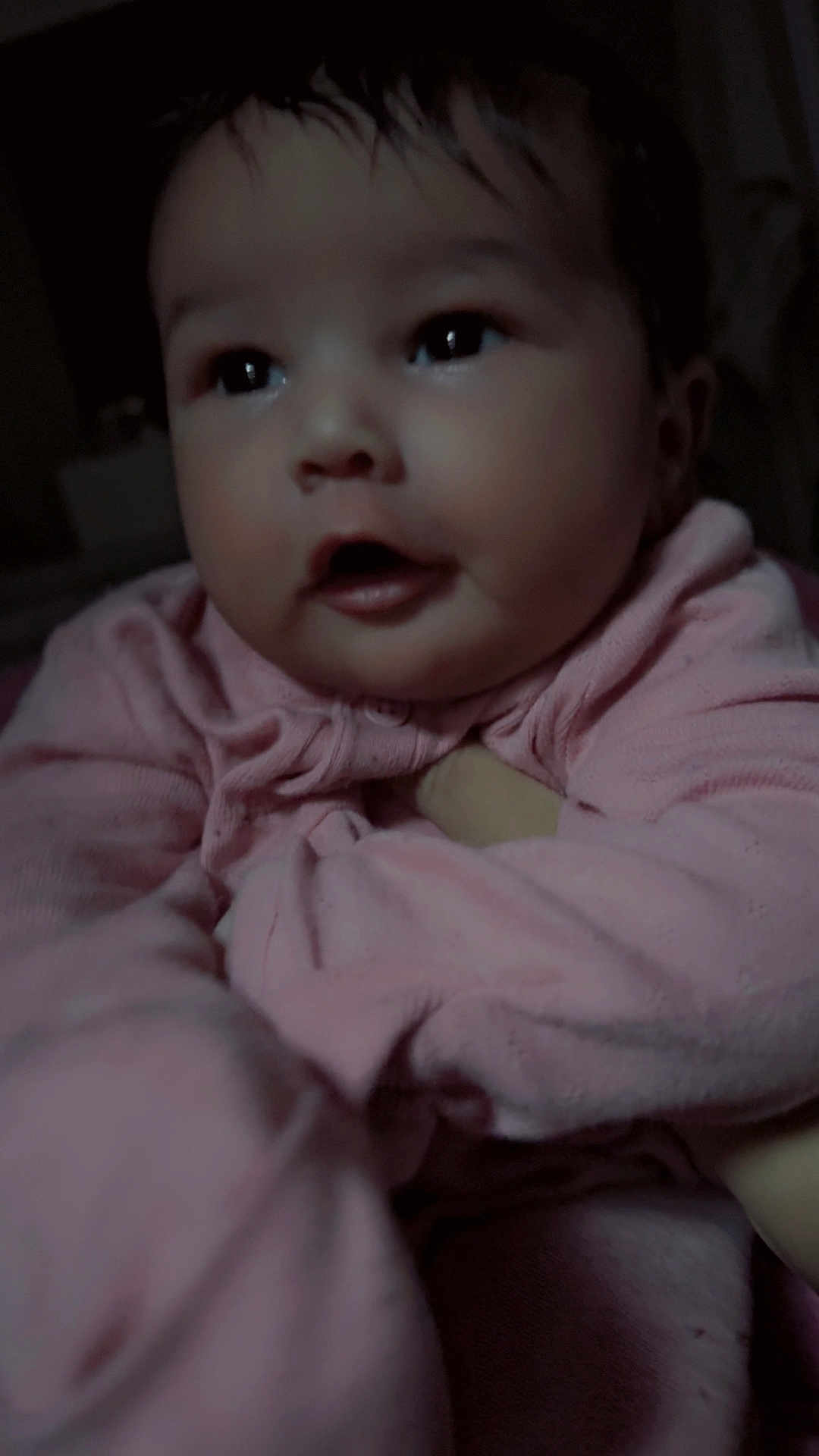 Khaleessi joined the competition — help win amazing prizes! baby, infant, child, face, eyes, cheeks, mouth, pajamas, pink_clothing, close_up, portrait, indoor, low_light, soft_lighting, hands, expression_surprised, adorable, cuteness, skin, blanket