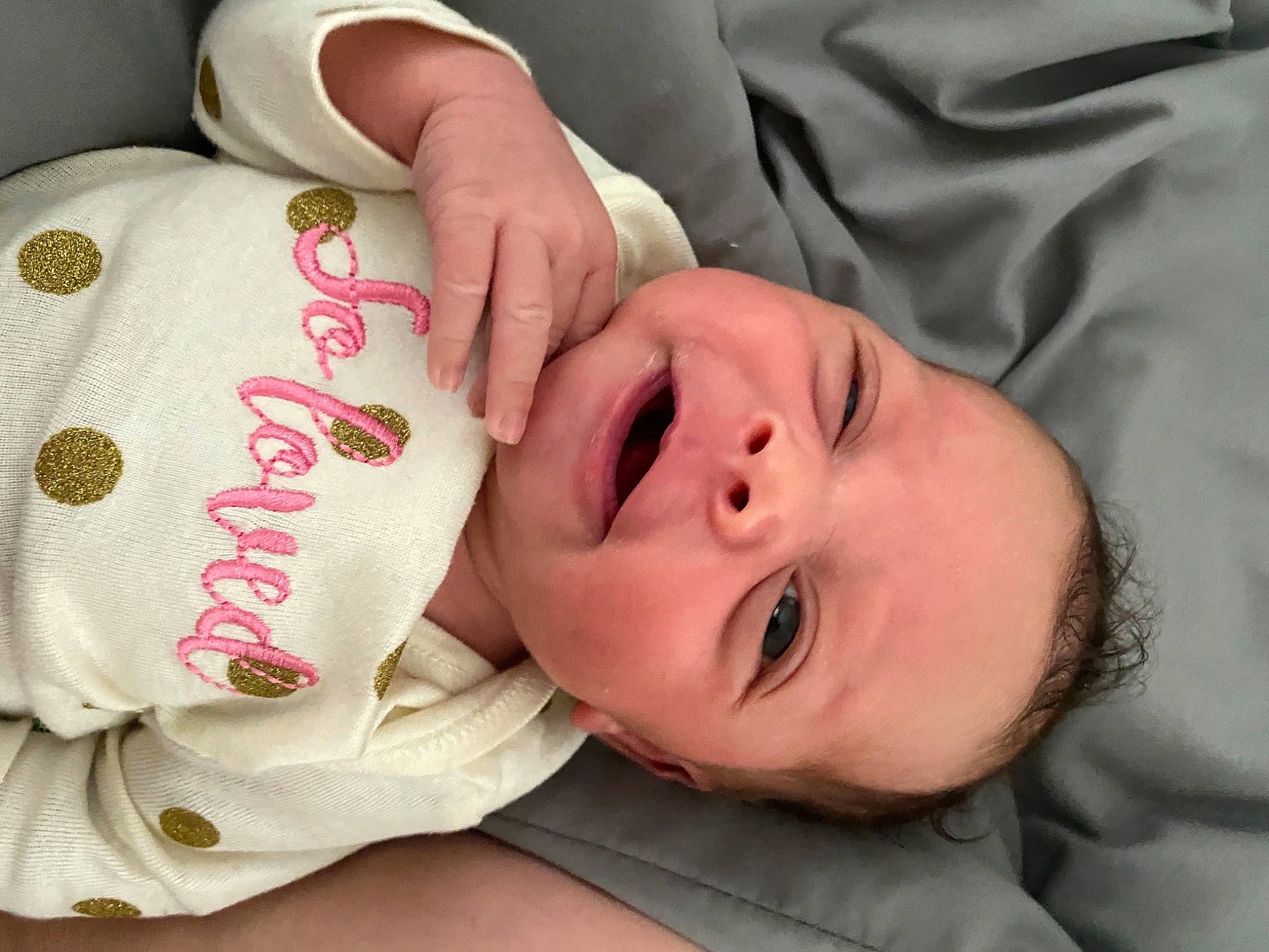 Andromeda is registered to the contest to win money with this photo: baby, baby_toddler_clothing, carmine, cheek, child, comfort, eyelash, finger, gesture, happy, head, lip, mammal, nail, neck, nose, person, skin, sleeve, toddler