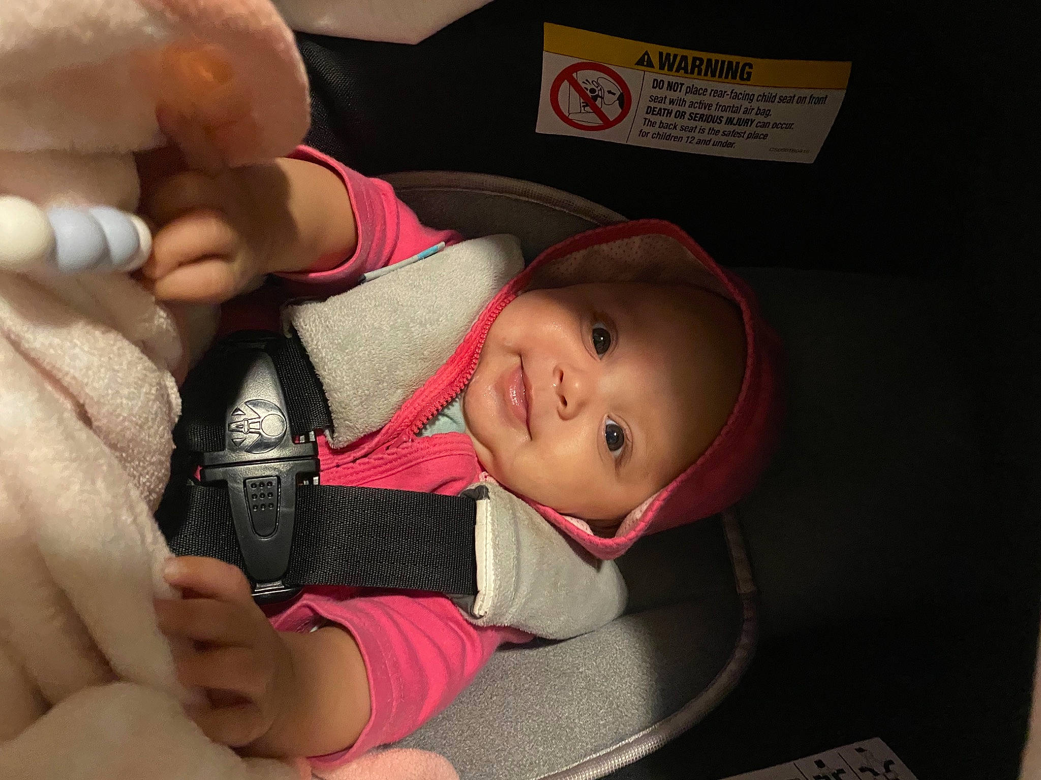Andromeda is registered to the contest to win money with this photo: baby, baby_carriage, baby_toddler_clothing, cap, cheek, comfort, eye, facial_expression, finger, gesture, hand, hat, head, headgear, headwear, human_body, joy, lip, mouth, nose