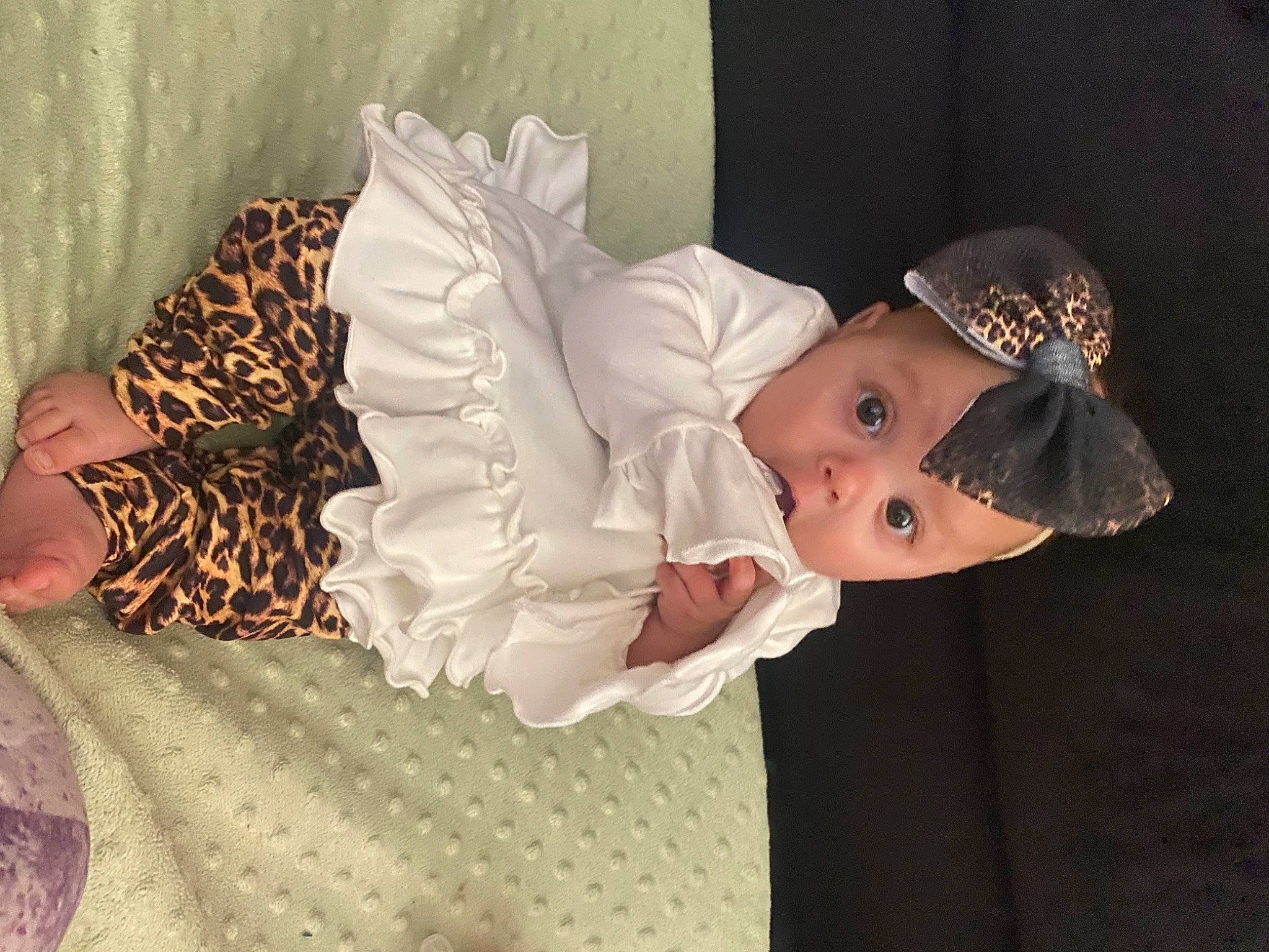 Andromeda is registered to the contest to win money with this photo: baby, baby_toddler_clothing, cap, child, comfort, costume_hat, dress, embellishment, event, eye, finger, fun, happy, hat, headpiece, human_body, pattern, person, sun_hat, surprise