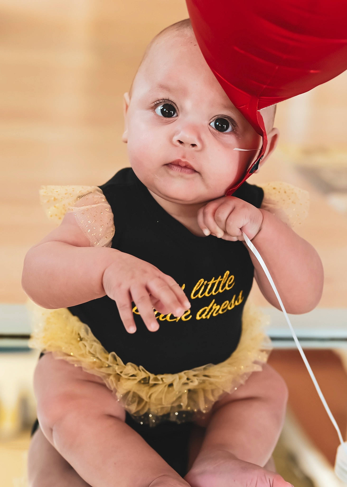 Andromeda is registered to the contest to win money with this photo: abdomen, baby, baby_toddler_clothing, cap, cheek, child, costume_hat, eye, fashion_accessory, finger, happy, hat, magenta, person, pink, sitting, sleeve, thigh, thumb, toddler