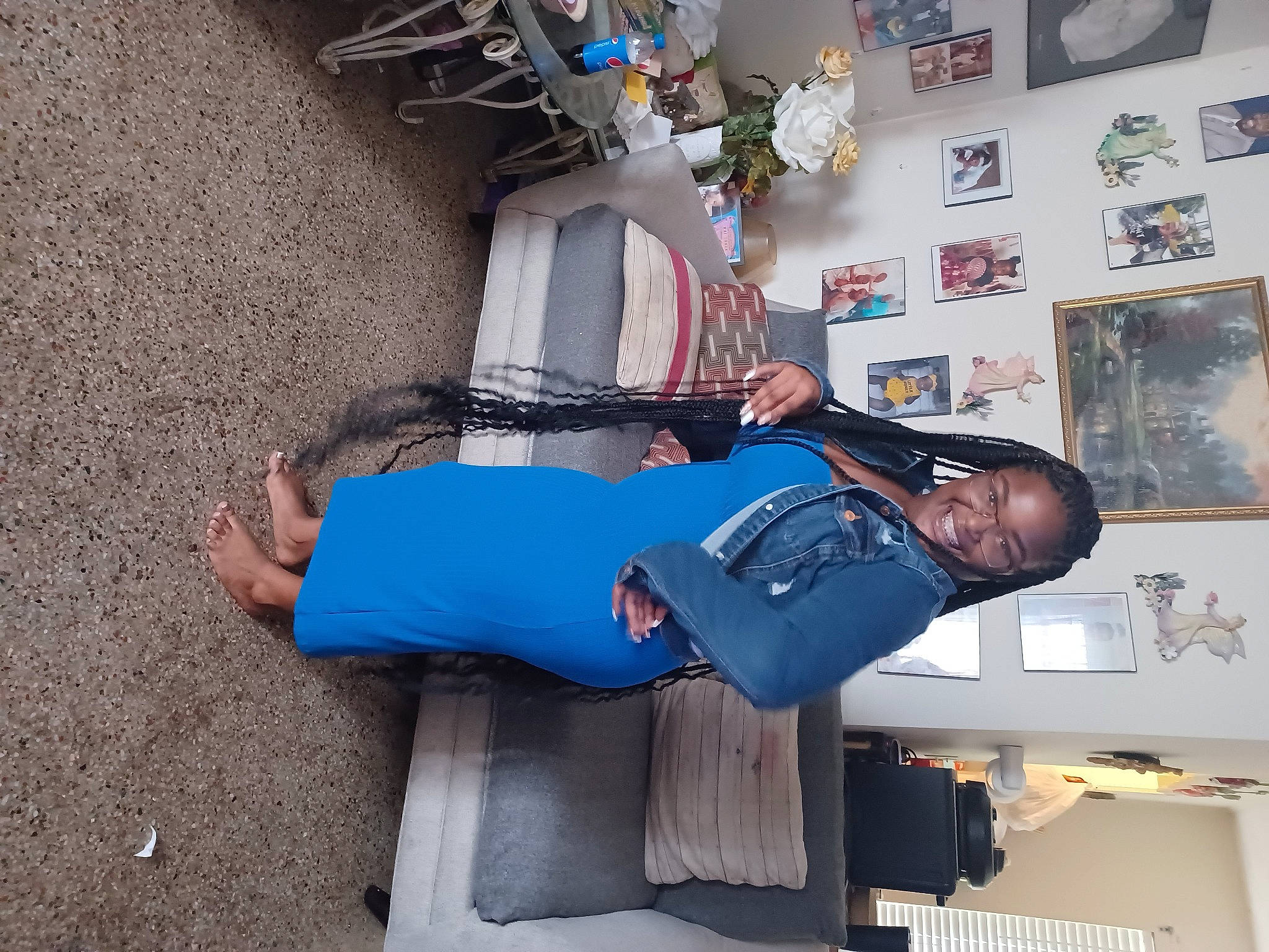 Kianna is registered to the contest to win money with this photo: arm, bag, building, comfort, denim, elbow, electric_blue, human_leg, joy, knee, luggage_and_bags, person, room, sitting, t_shirt, thigh, travel, visual_arts, walking_shoe, wrist
