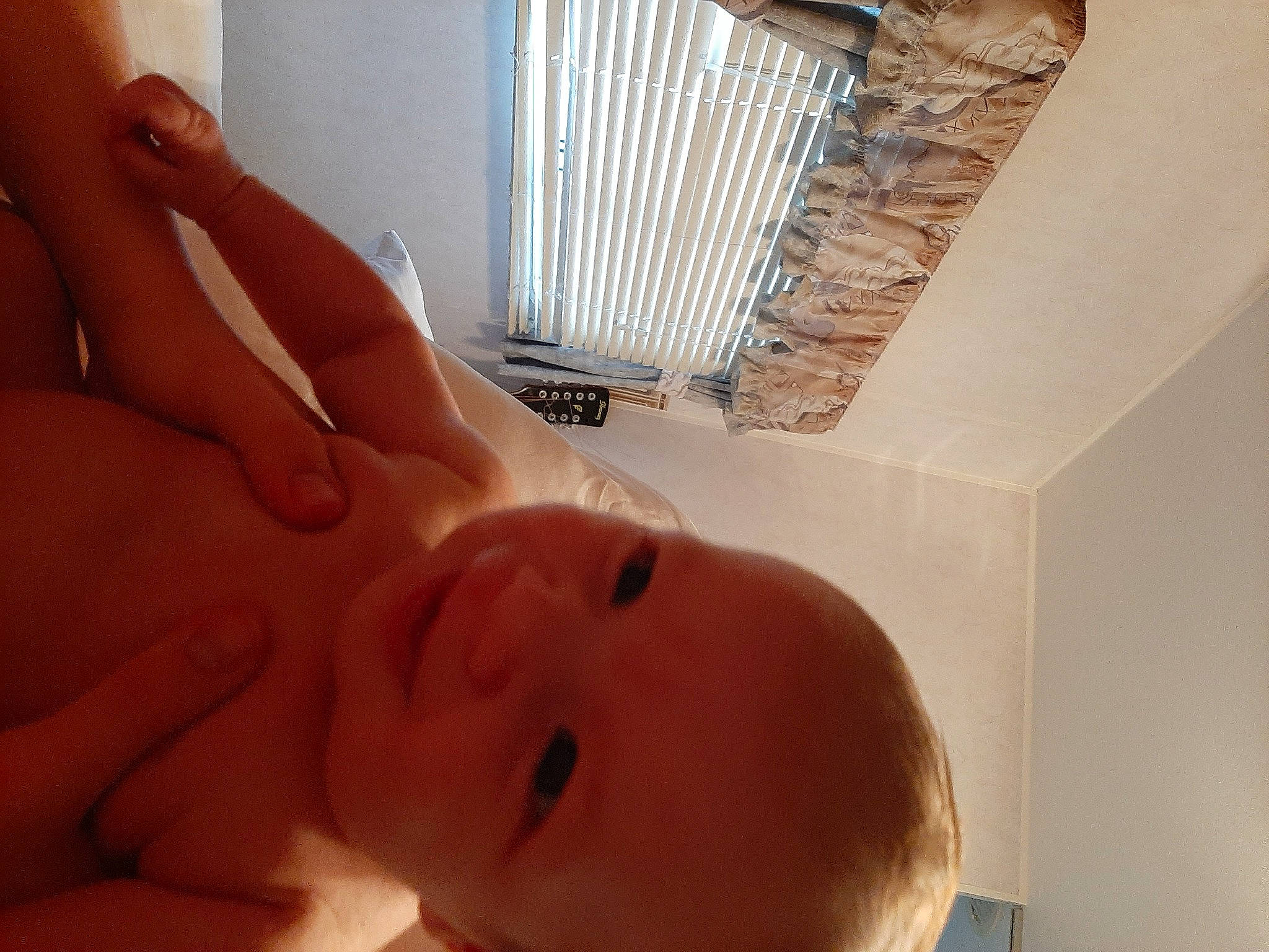 Flynn is registered to the contest to win money with this photo: abdomen, chest, chin, ear, eye, eyebrow, eyelash, finger, gesture, happy, head, lip, mouth, neck, nose, person, skin, smile, thumb, toddler