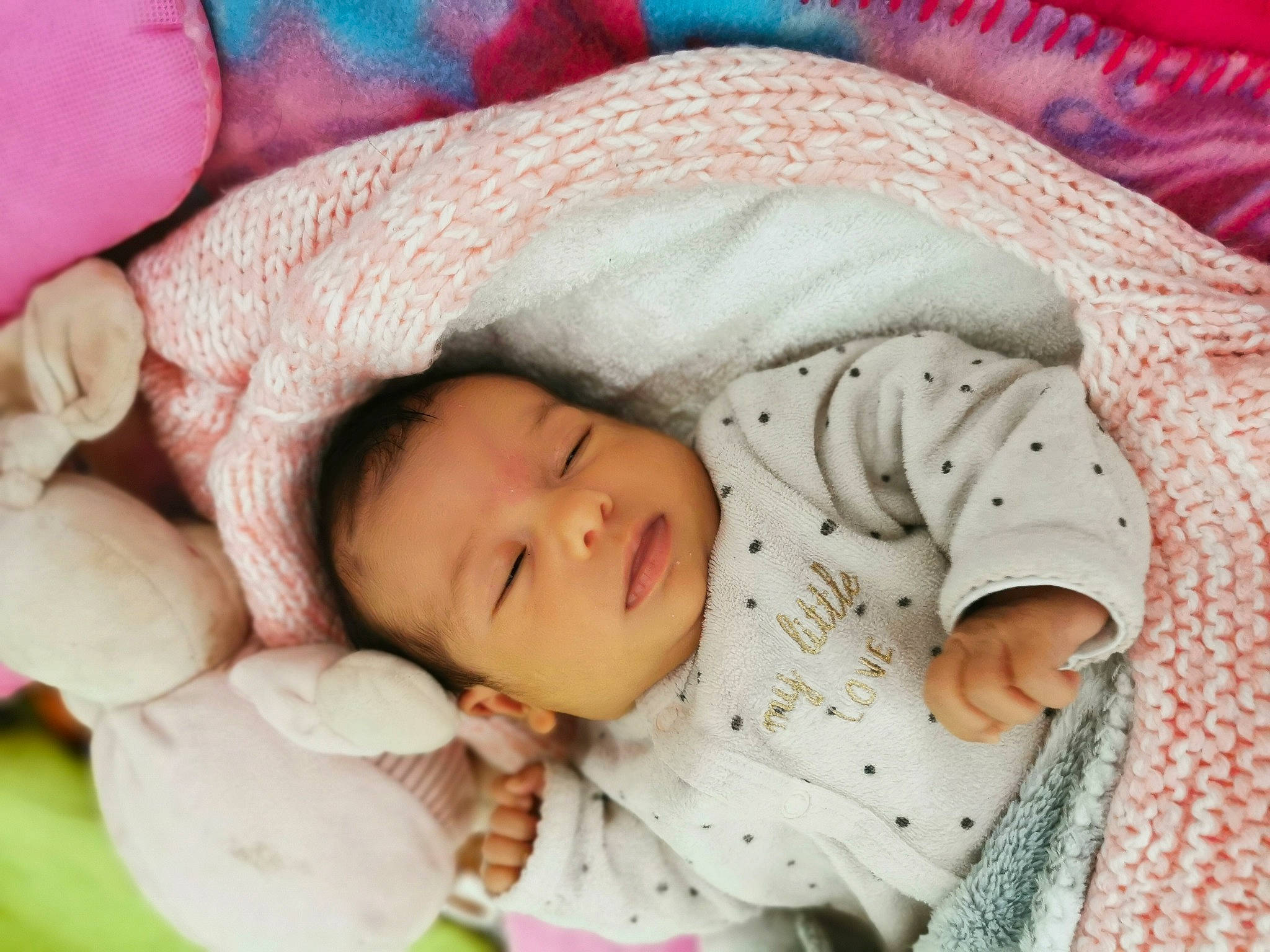 Elena participe au concours pour gagner de l'argent avec cette photo : baby, baby_products, baby_sleeping, baby_toddler_clothing, bedtime, cheek, child, comfort, eye, grass, head, linens, mammal, person, pink, room, skin, sleeve, textile, toddler